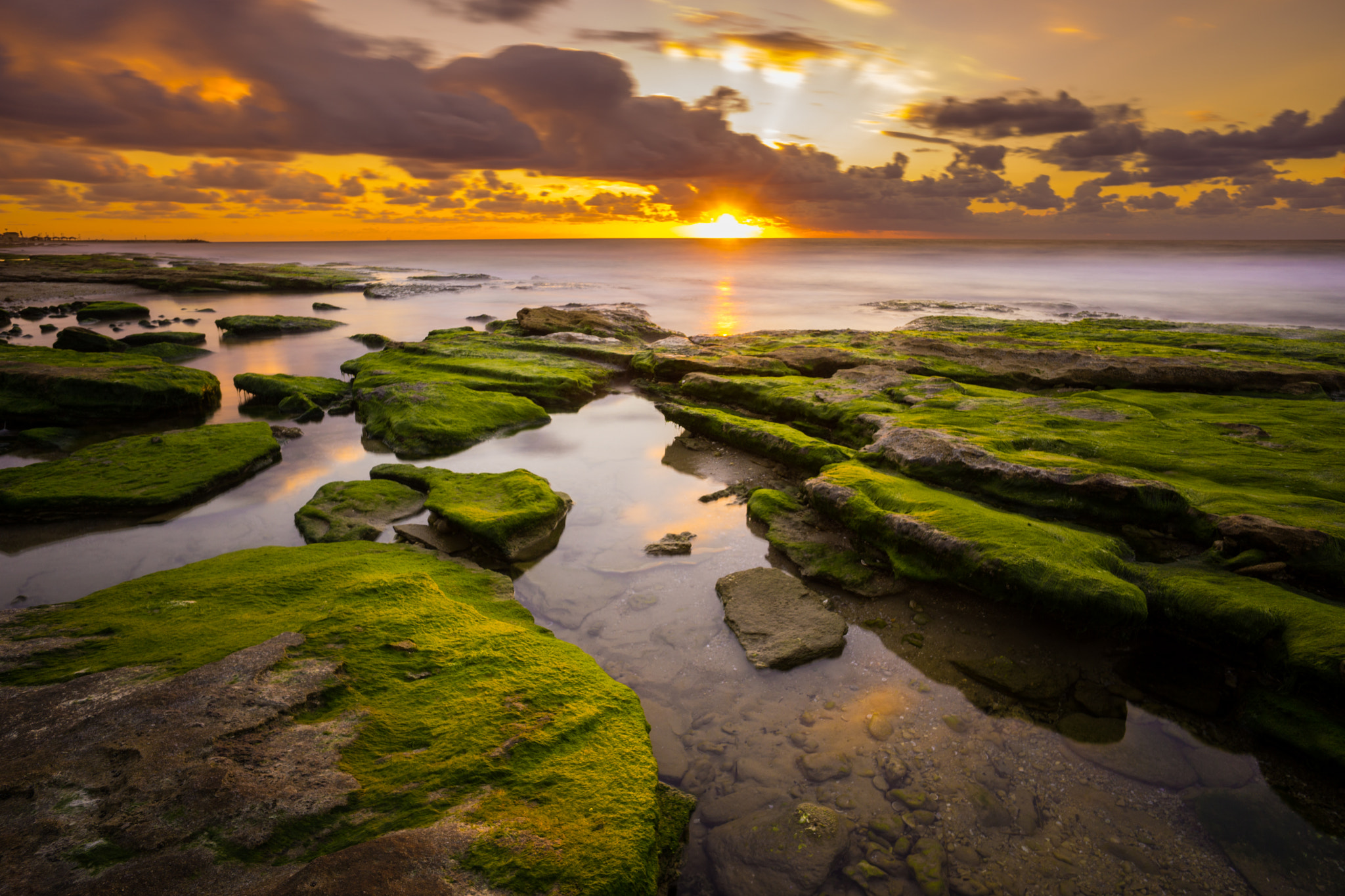 ZEISS Touit 12mm F2.8 sample photo. Rock shelves pool photography