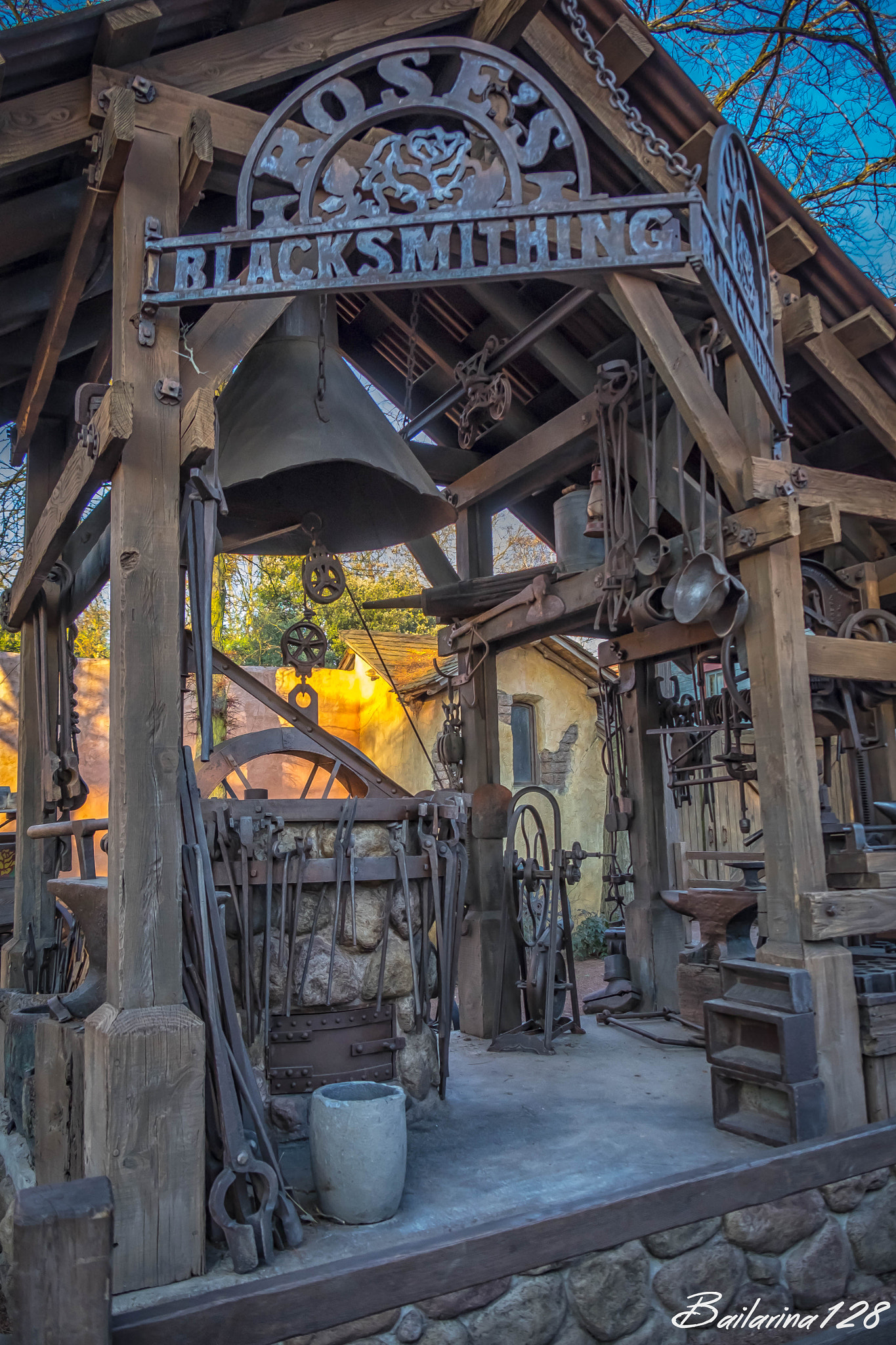 Fujifilm X-T10 + Fujifilm XF 18-135mm F3.5-5.6 R LM OIS WR sample photo. Rose's blacksmithing in frontierland photography