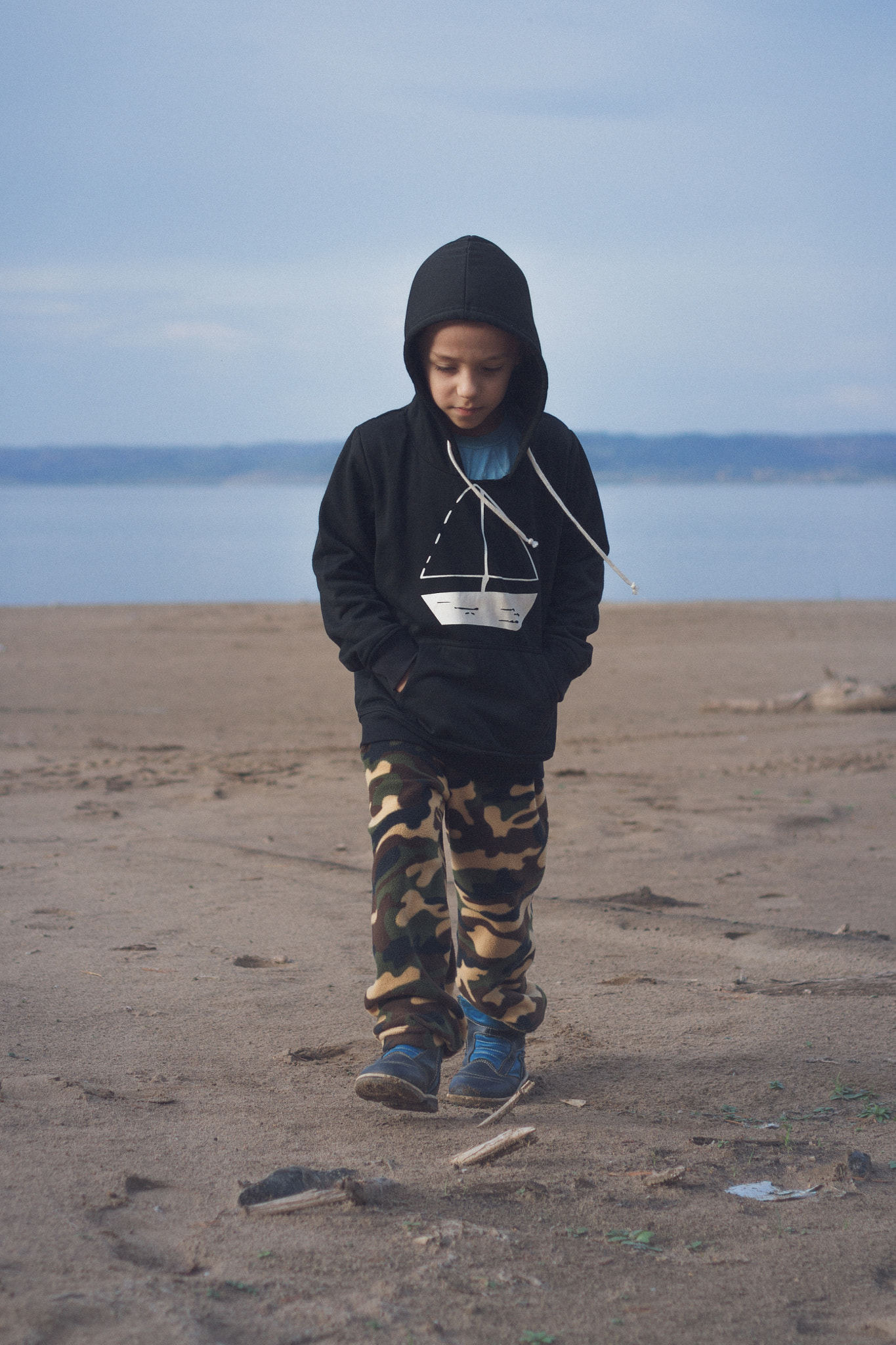 Canon EF 50mm F2.5 Macro sample photo. The boy in a black hoodie. photography