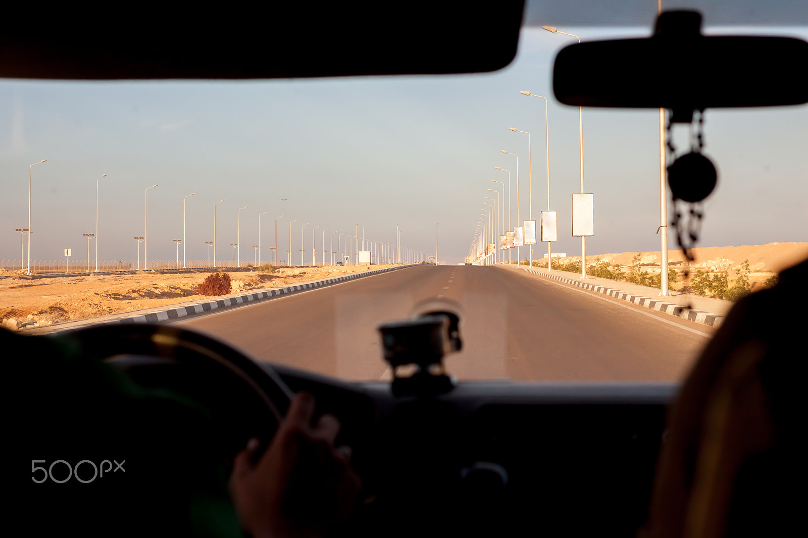 Canon EOS 500D (EOS Rebel T1i / EOS Kiss X3) + Canon EF 40mm F2.8 STM sample photo. View through windshield in egypt photography