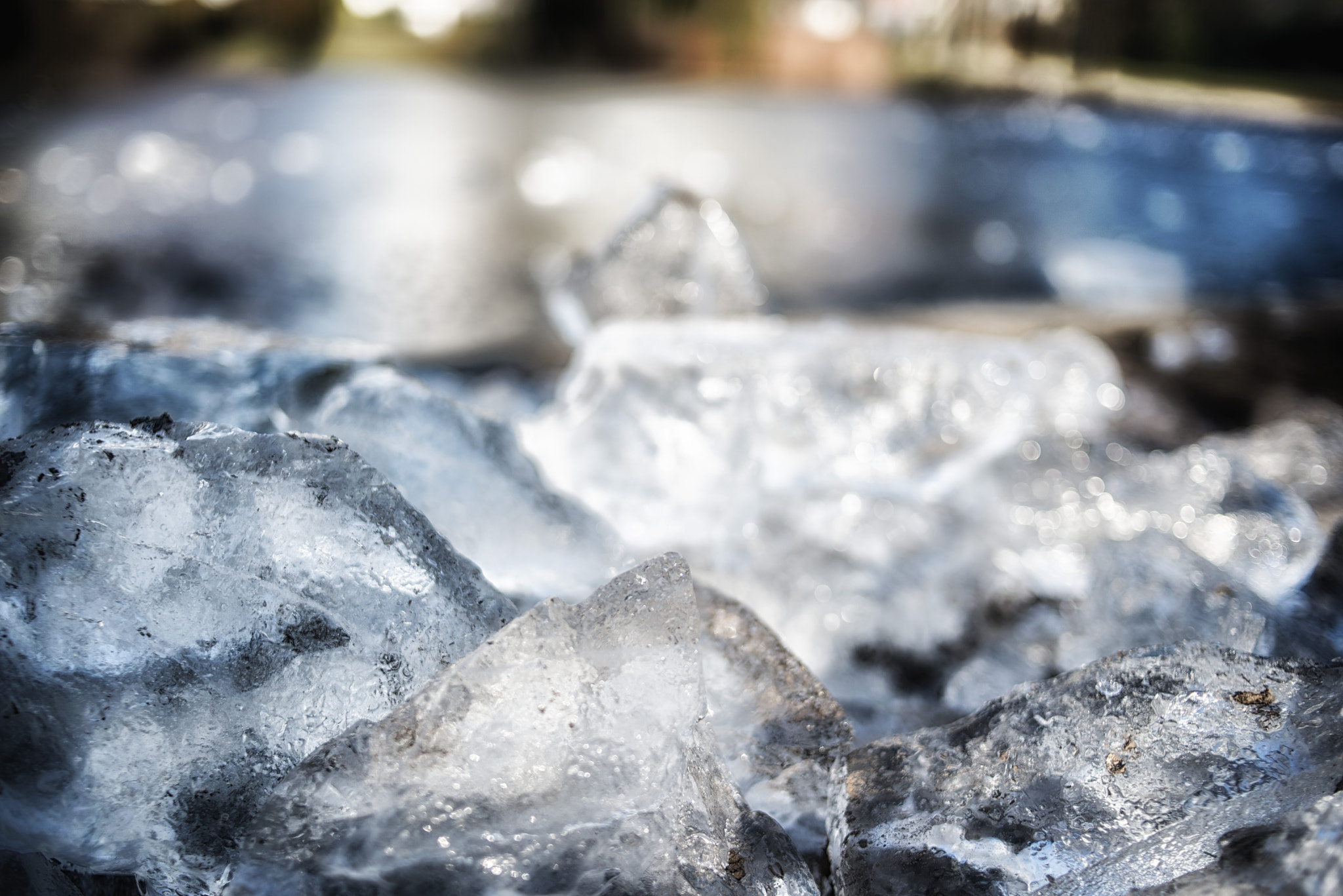 Nikon D600 + Nikon AF-S DX Nikkor 35mm F1.8G sample photo. Crushed ice from pond photography