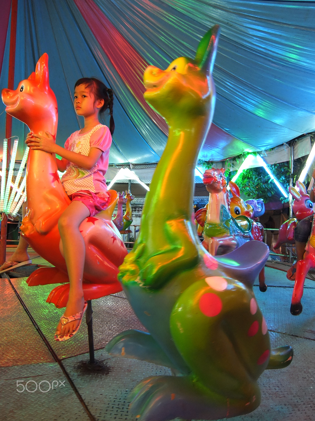 Fujifilm XF1 sample photo. Vivid merry-go-round photography