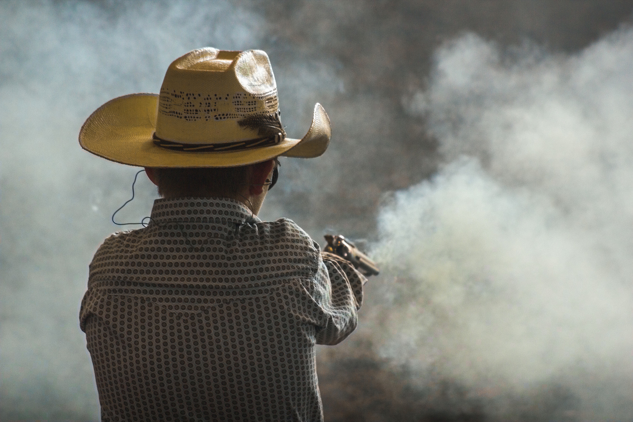 Canon EF 75-300mm f/4-5.6 USM sample photo. Cowboy mounted shooting photography