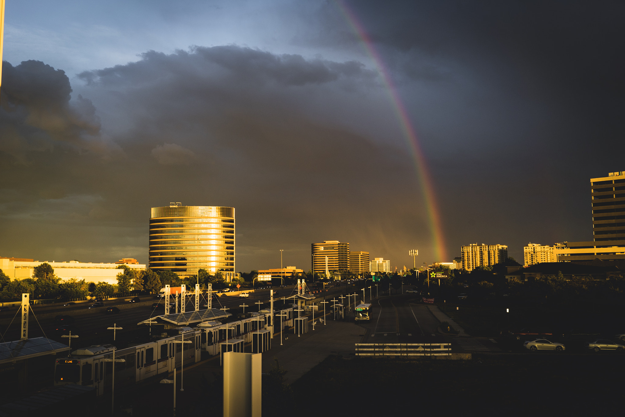 Sony a7S + Sony Sonnar T* FE 35mm F2.8 ZA sample photo. A rainbow in denver photography