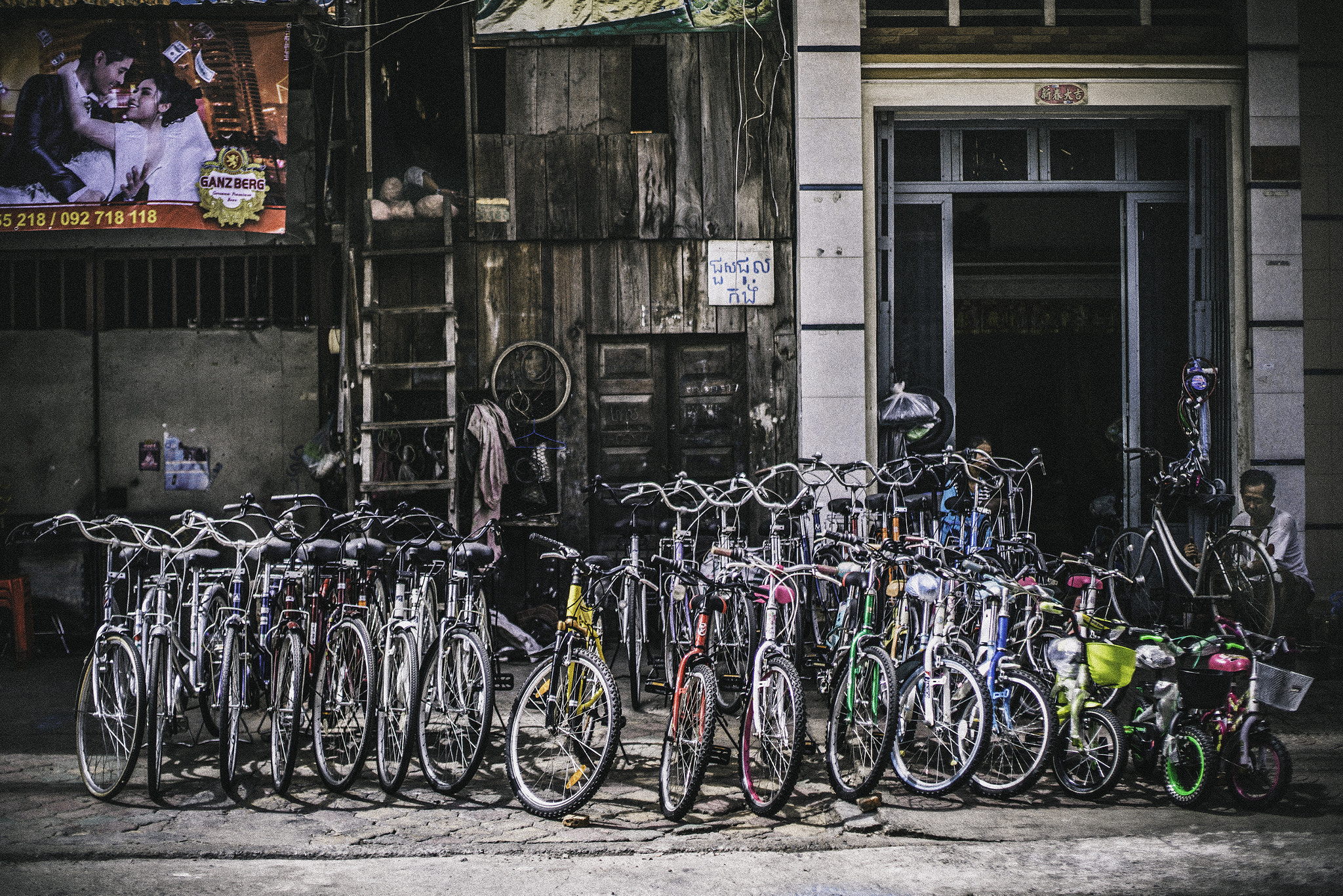 Sony a7R II + Canon EF 50mm F1.4 USM sample photo. Bike shop and repairs photography