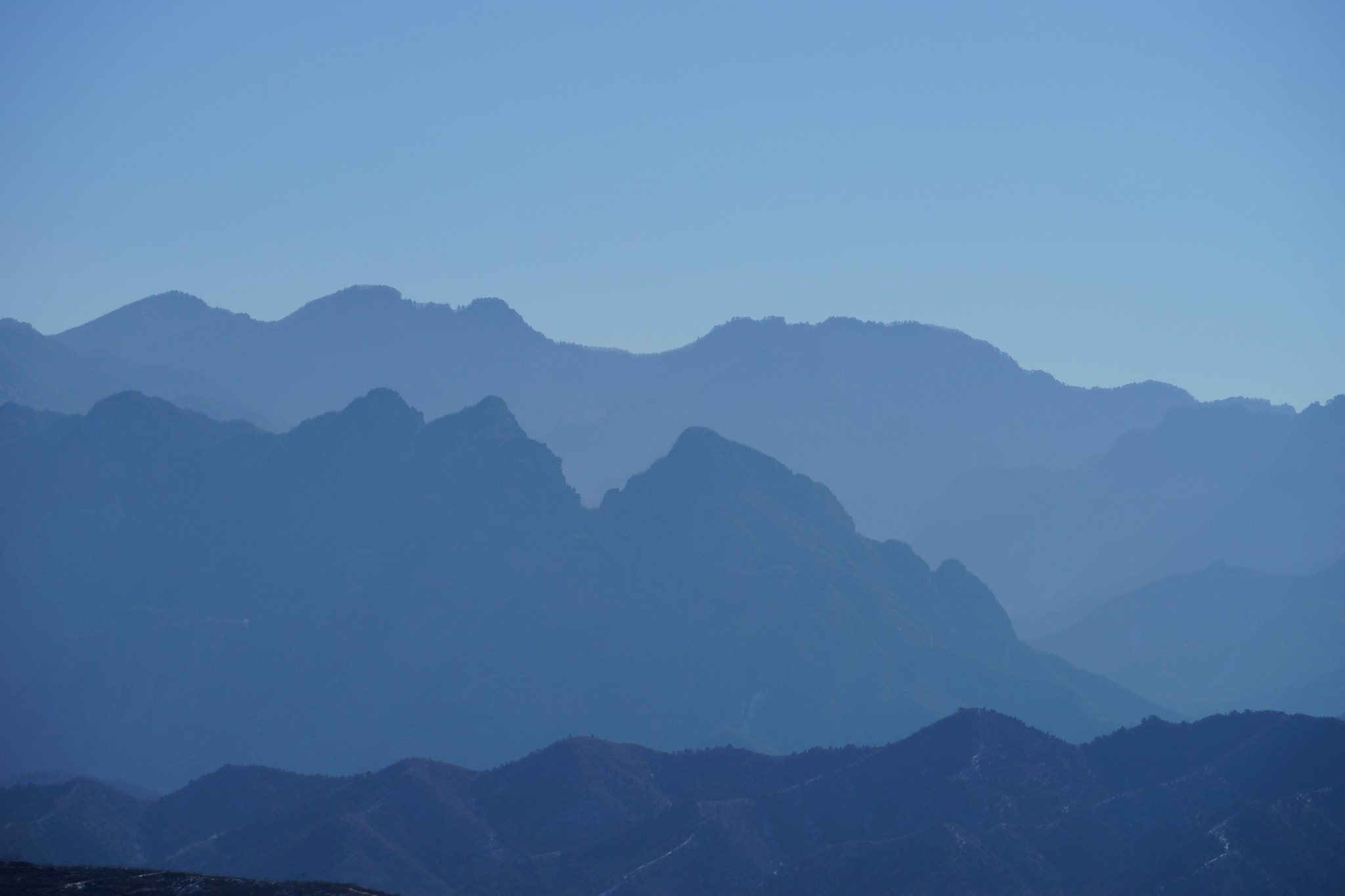 Sony a7 + Sony FE 70-200mm F4 G OSS sample photo. The mountain ranges rise and fall photography