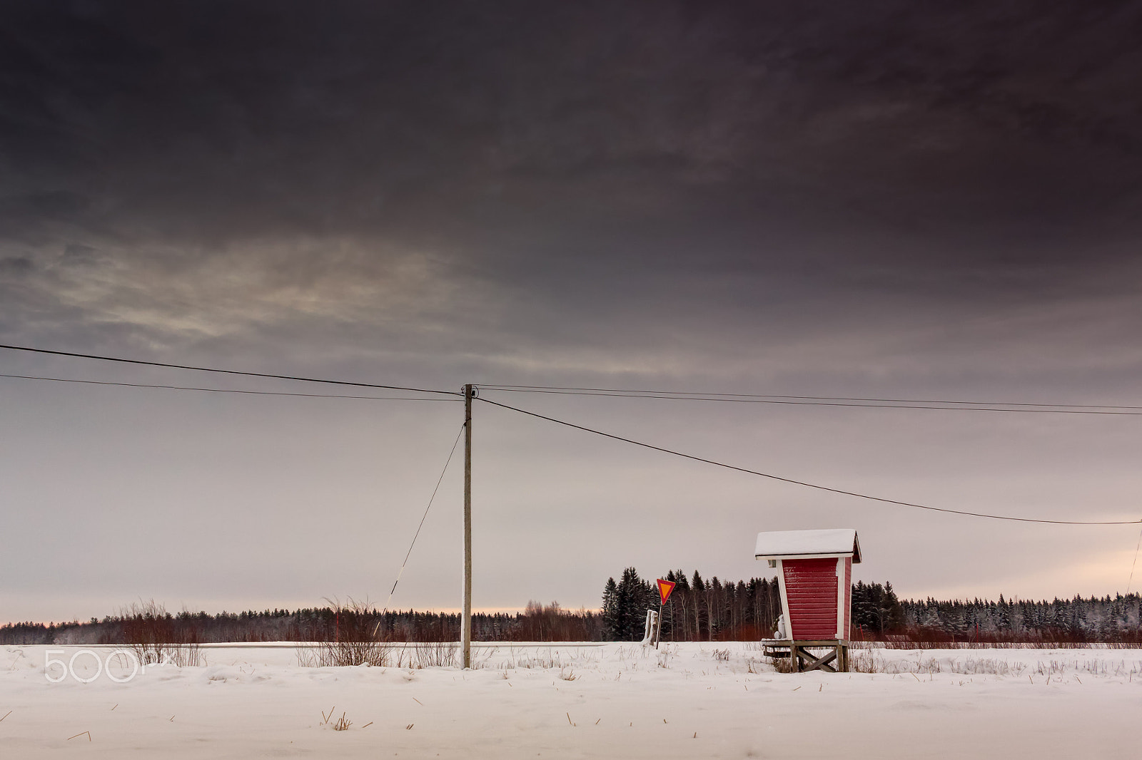 Canon EF-S 24mm F2.8 STM sample photo. Milk shelter under the dramatic sky photography