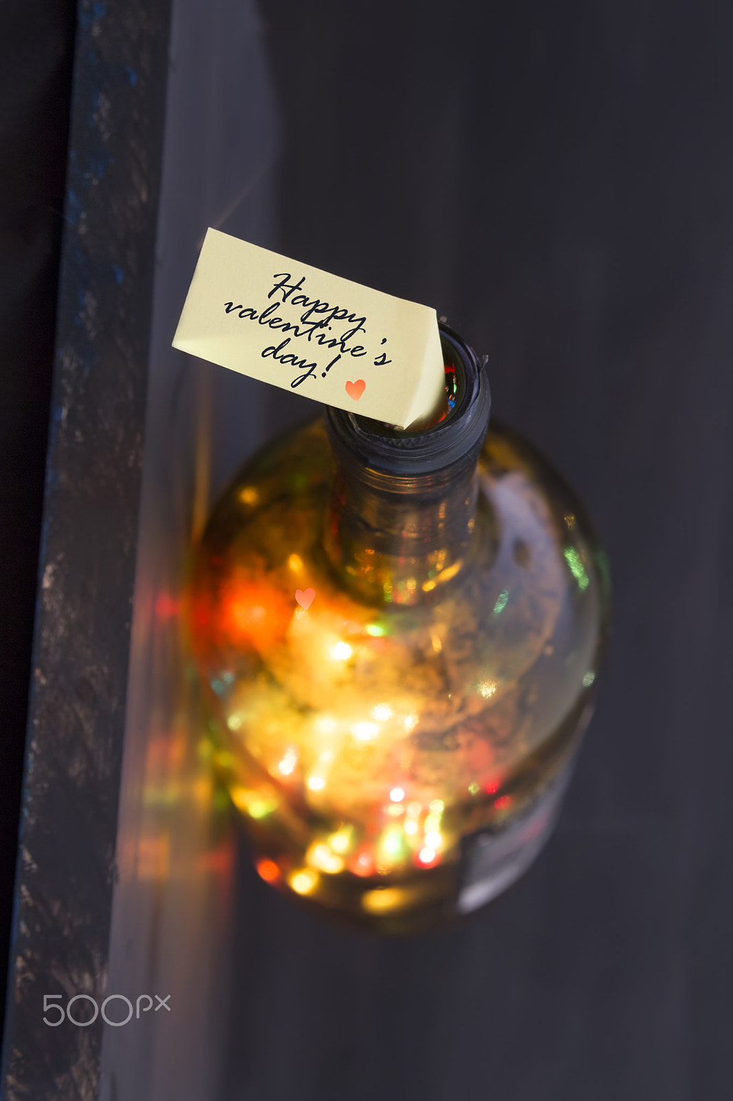 Sigma 18-200mm f/3.5-6.3 DC OS sample photo. Happy valentines day tag and bottle with lights photography