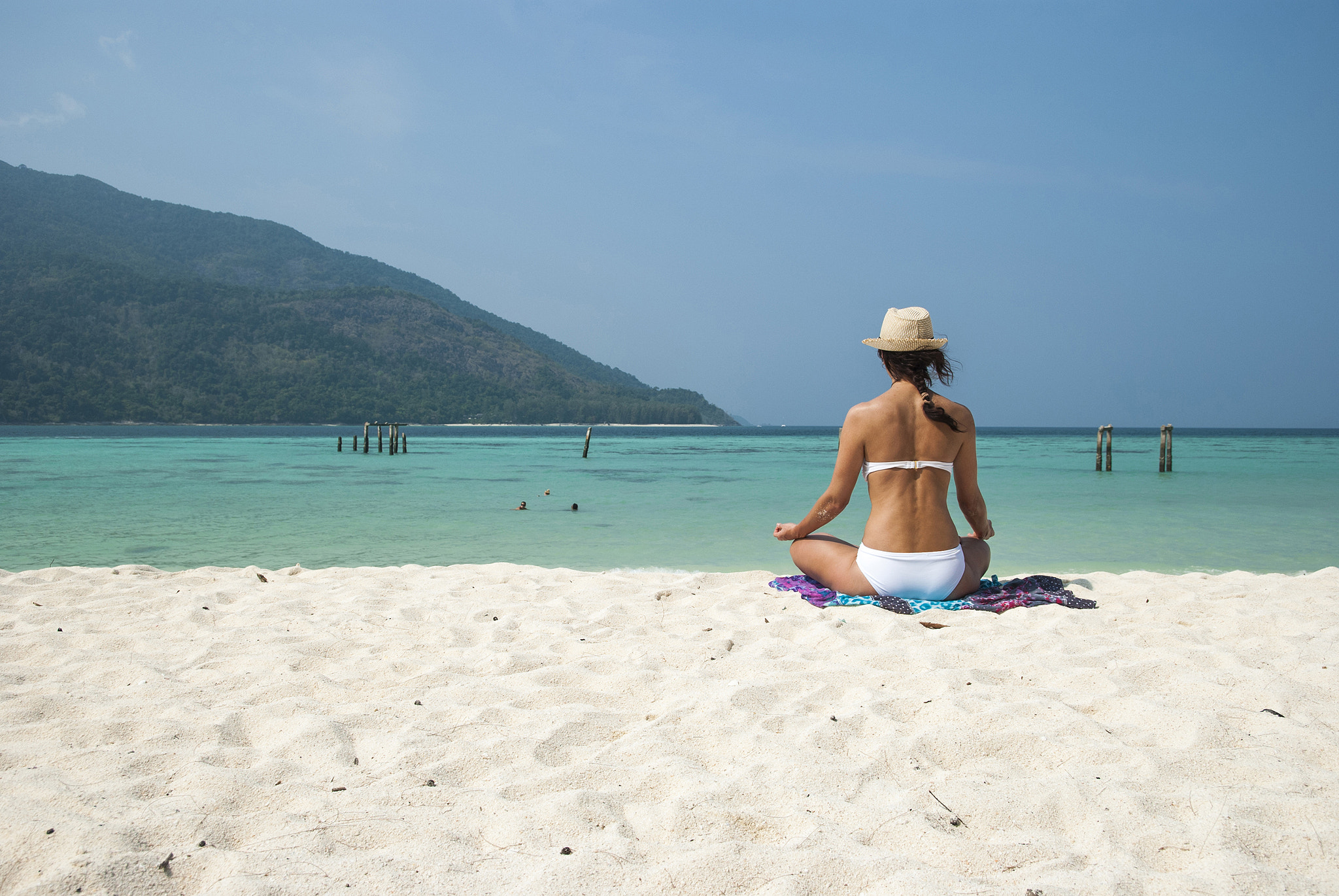 Nikon D80 sample photo. Beach meditation. woman meditating on beach sitting in lotus pos photography