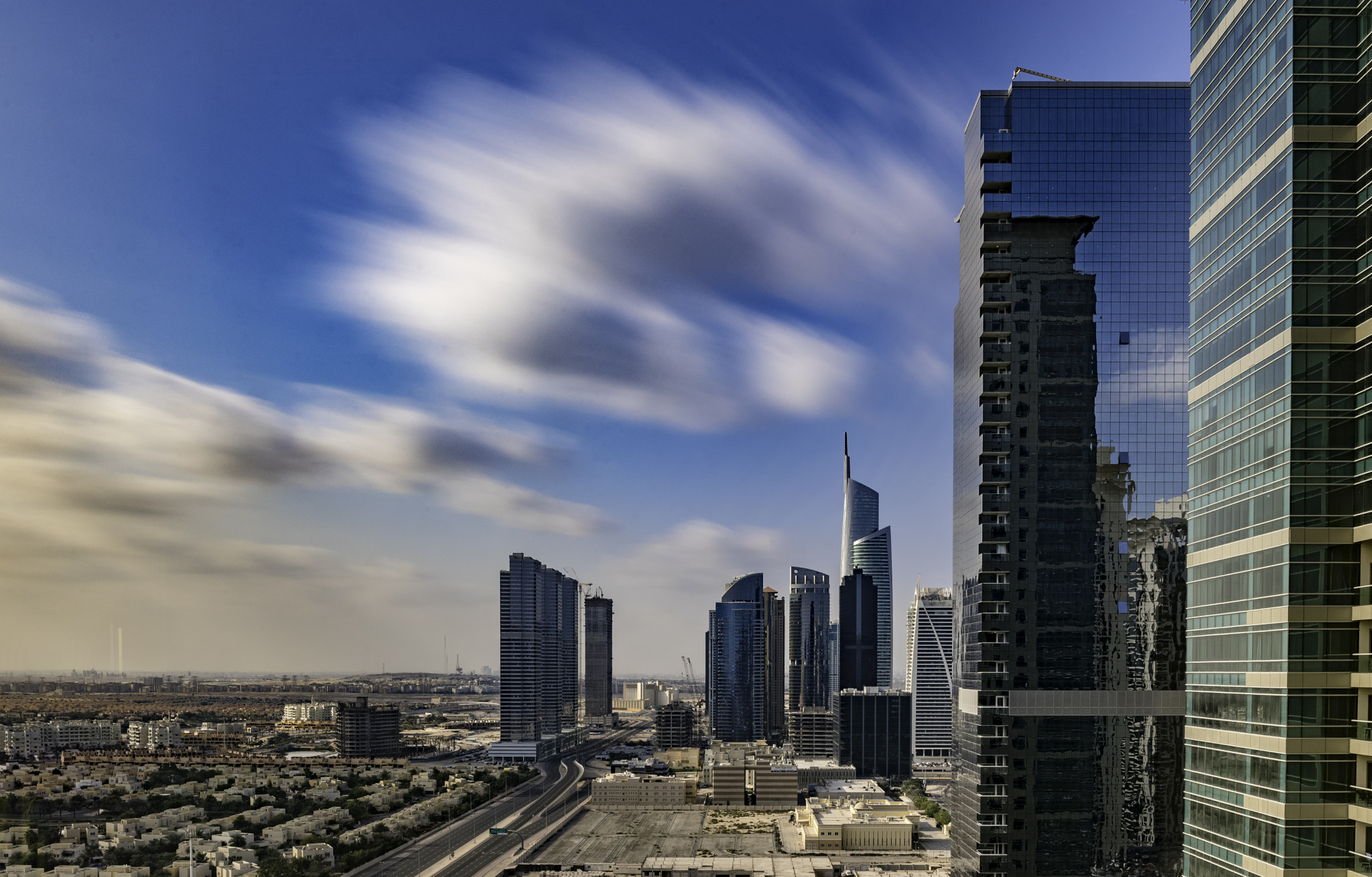 Nikon D750 + Nikon AF-S Nikkor 28mm F1.8G sample photo. Speeding clouds photography