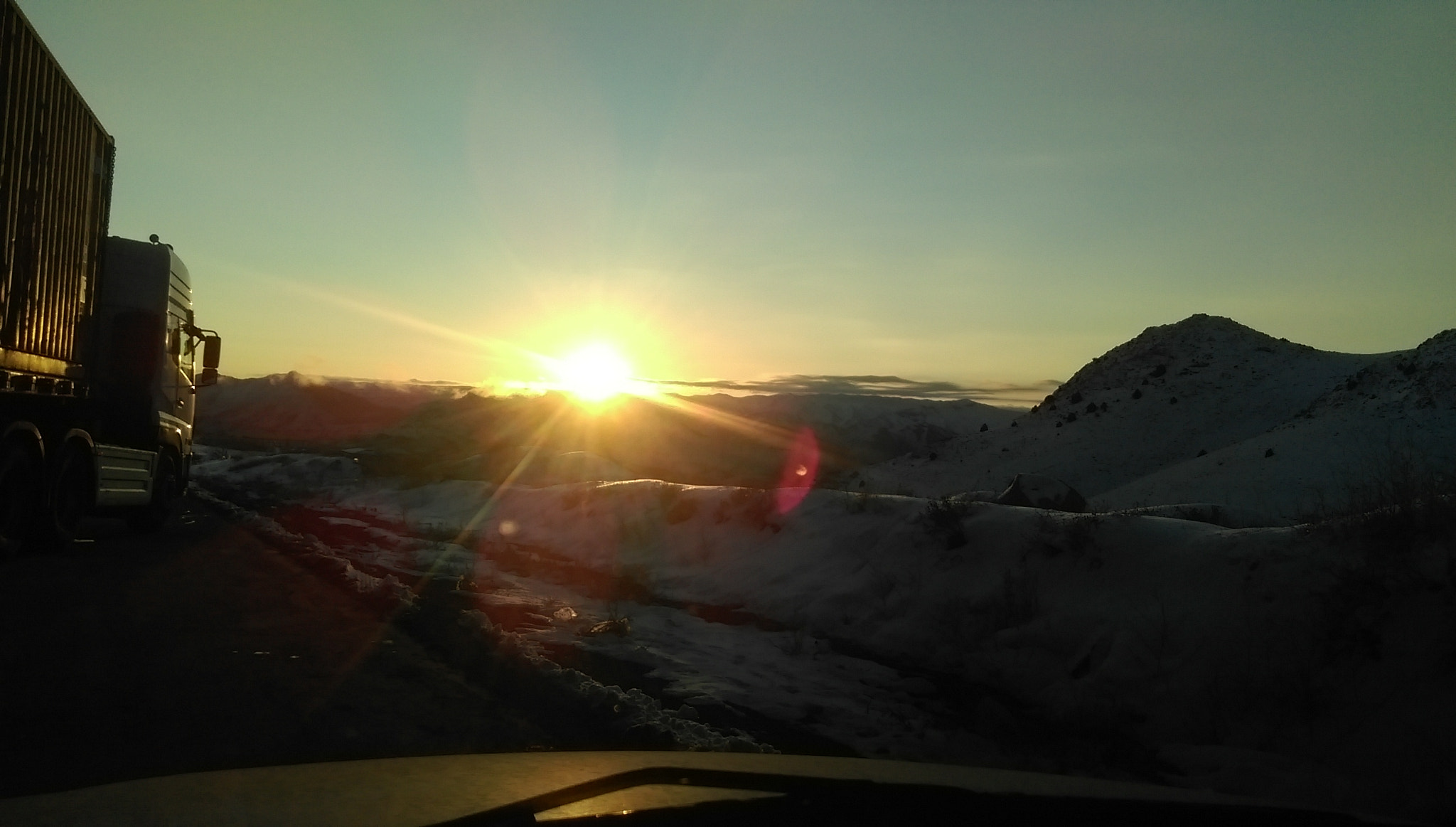 HTC ONE (E8) DUAL SIM sample photo. Sunset behind the mountains snow photography