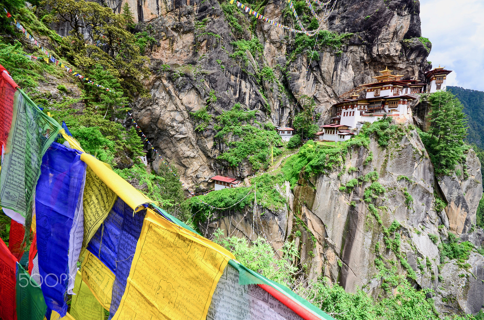 Sigma 10-20mm F4-5.6 EX DC HSM sample photo. Bhutanese prayer flags and the taktsang monastery photography