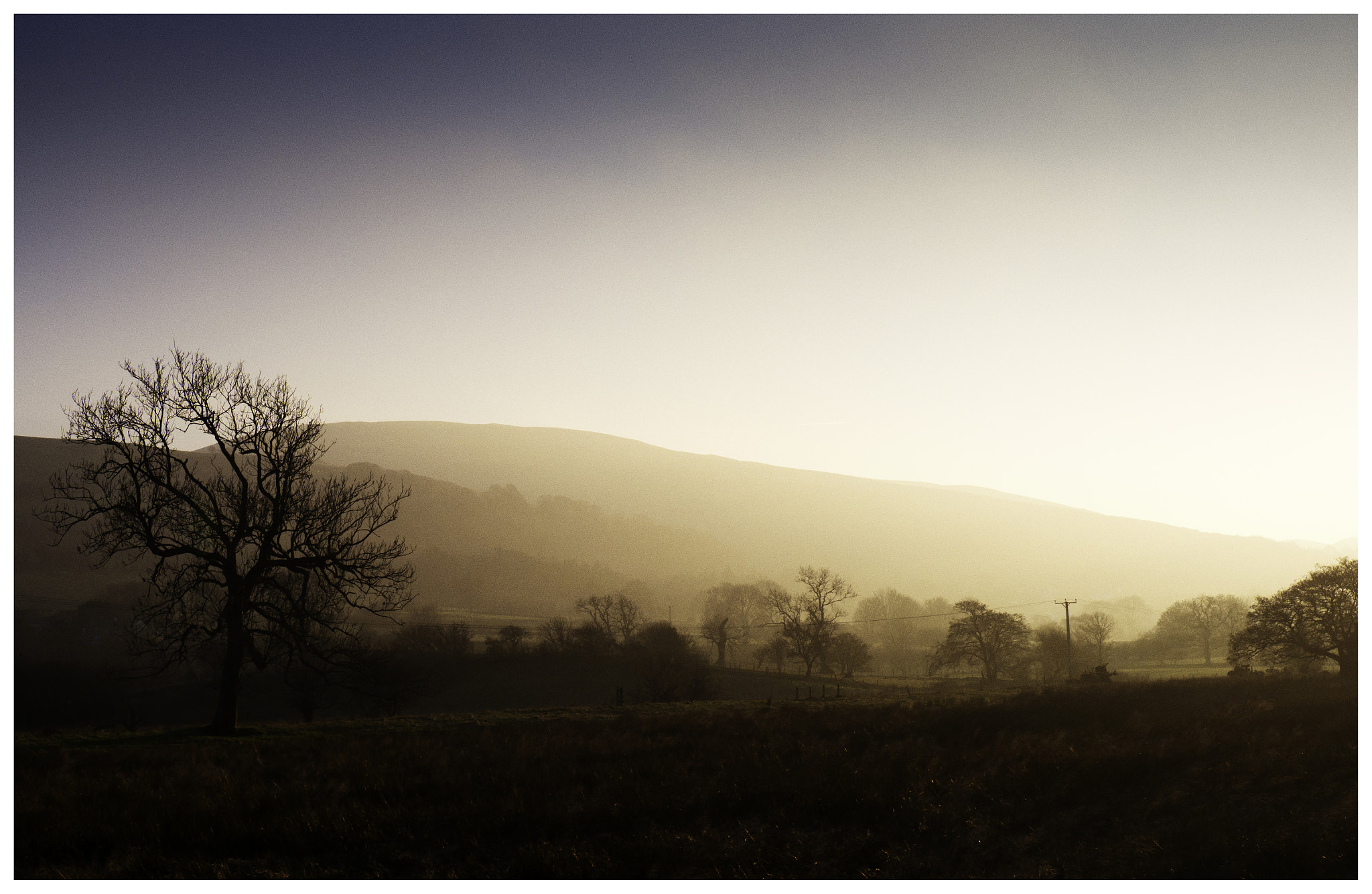 Panasonic Lumix DMC-GX7 sample photo. Sunset and fog photography