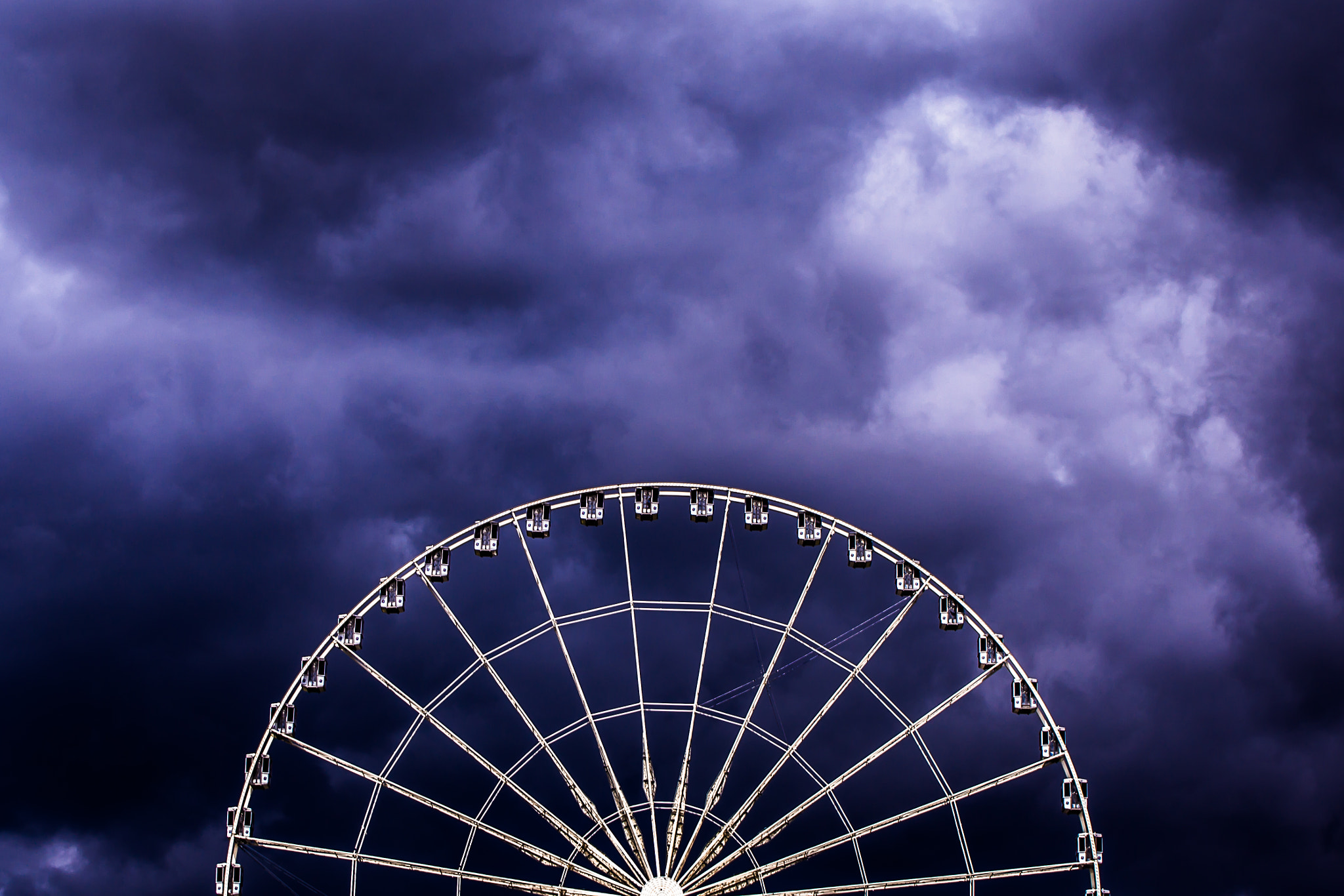 Olympus PEN E-P5 sample photo. Clouds over the wheel photography