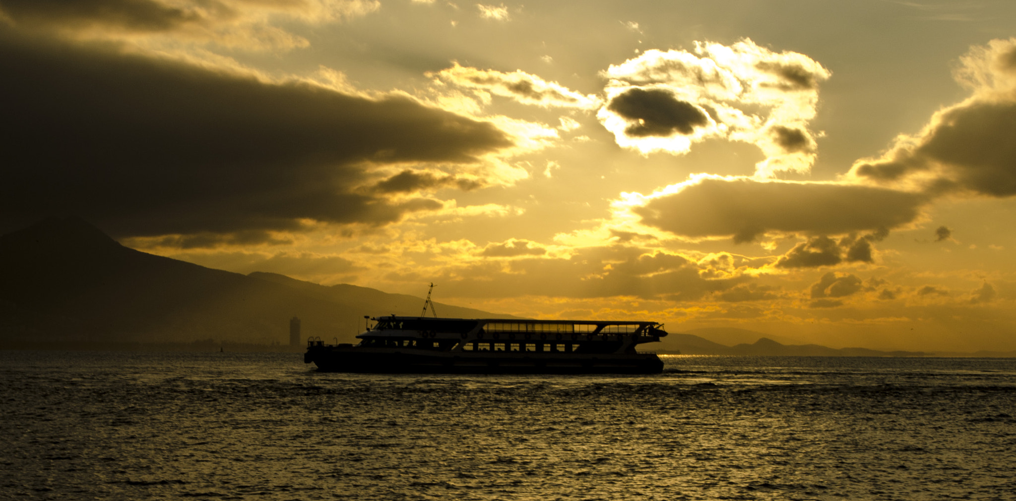 Nikon D5100 + Sigma 17-70mm F2.8-4 DC Macro OS HSM sample photo. The boat at the sunset photography