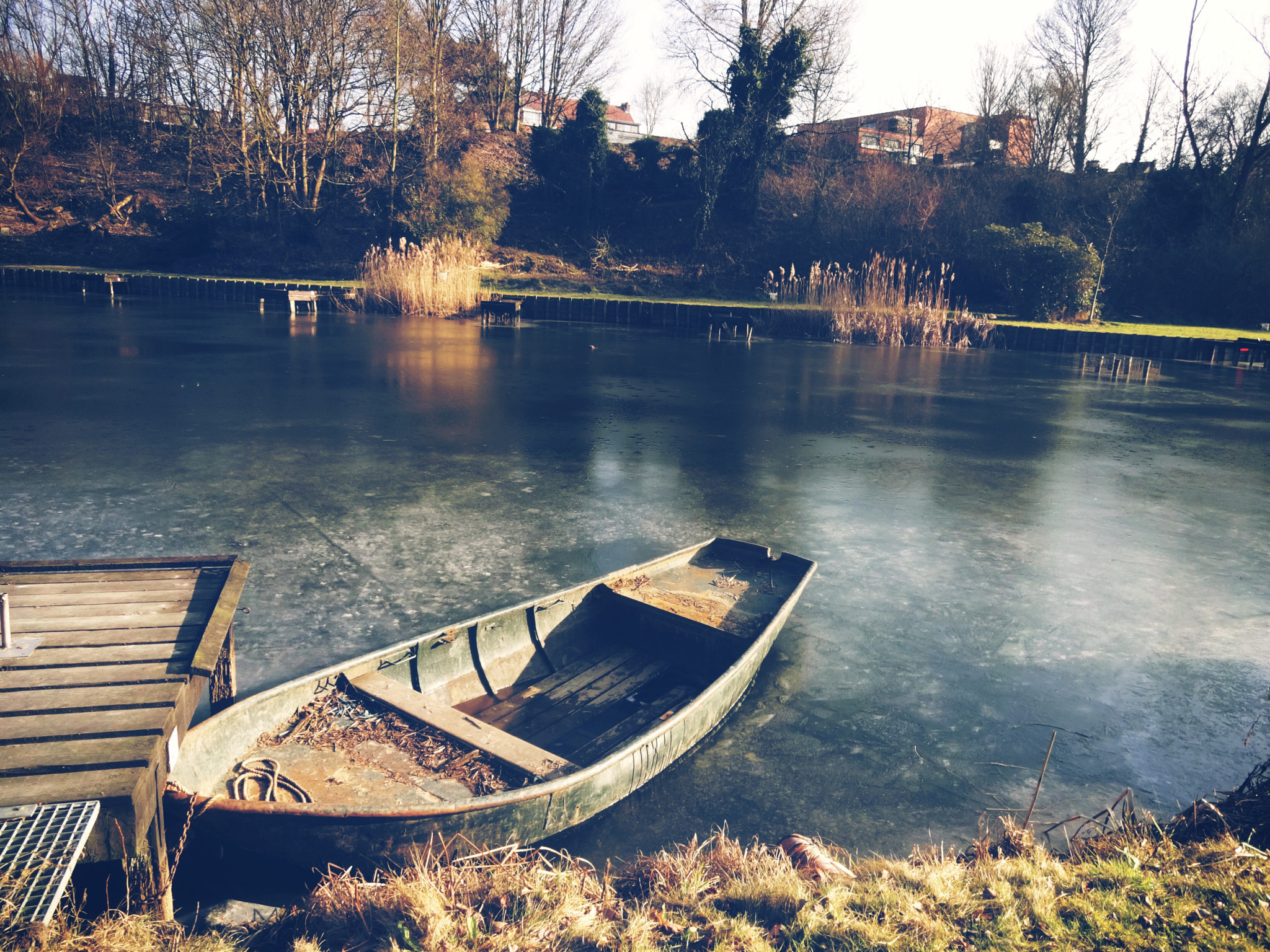 Sony Cyber-shot DSC-QX10 sample photo. Boat on frozen water photography