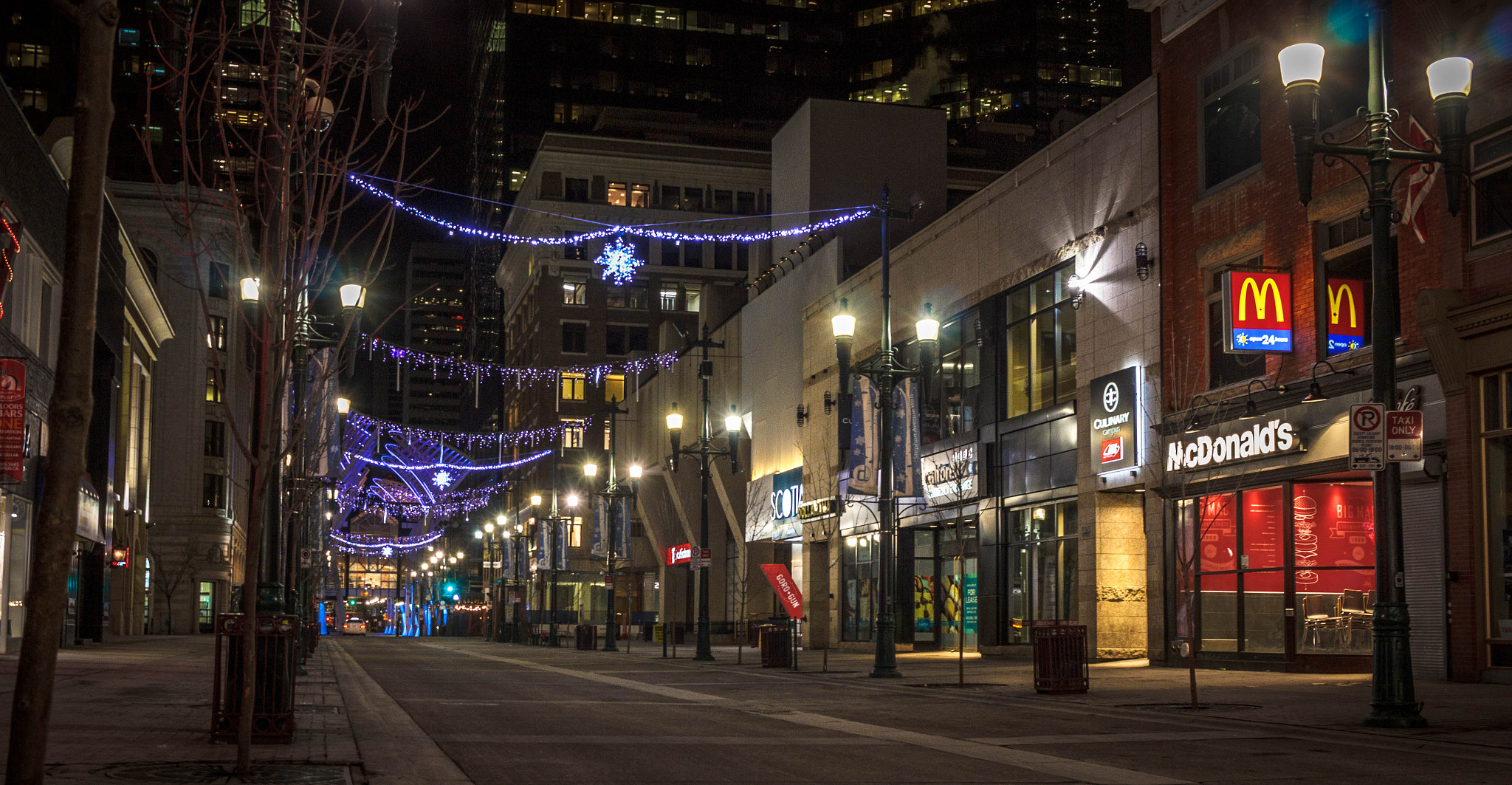 Canon EF-S 24mm F2.8 STM sample photo. Downtown calgary at night photography