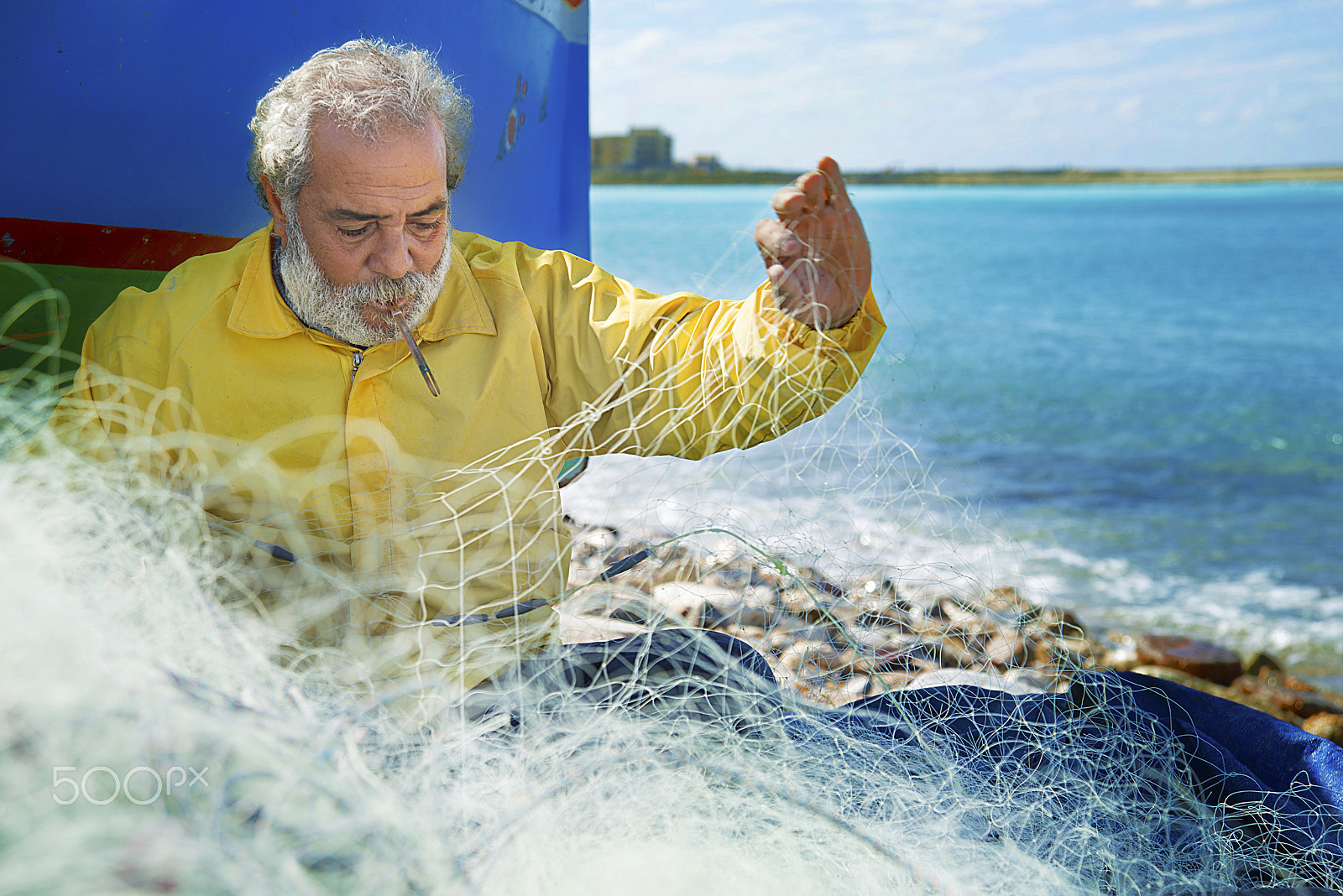 Nikon AF Nikkor 24-85mm F2.8-4D IF sample photo. Fishing net maker photography