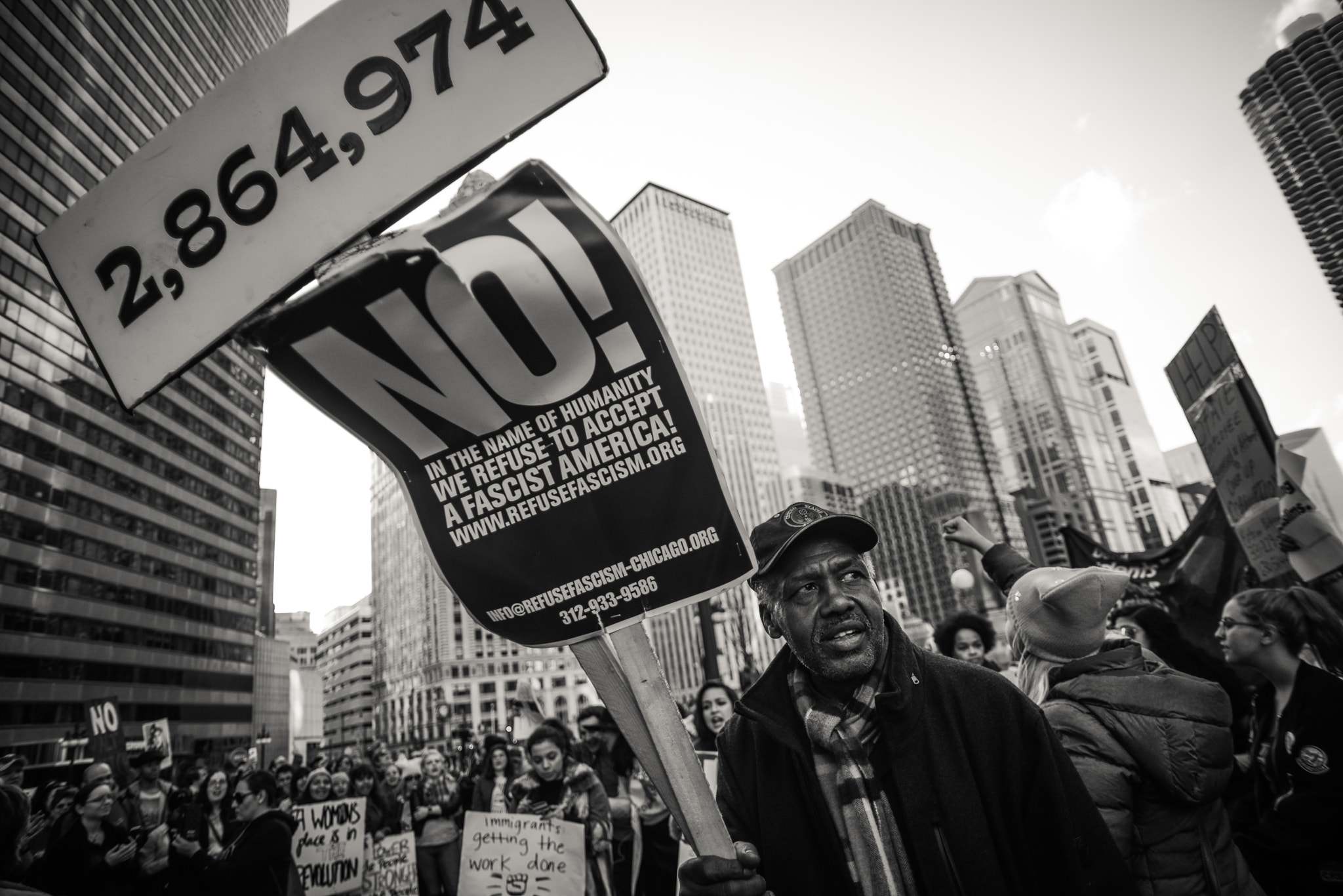 Nikon D800E + AF Nikkor 20mm f/2.8 sample photo. Women's march chicago sign. photography