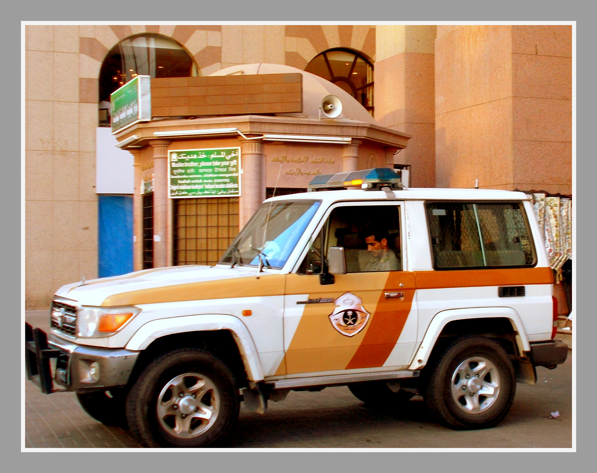 Nikon COOLPIX L27 sample photo. A saudi police patrol photography