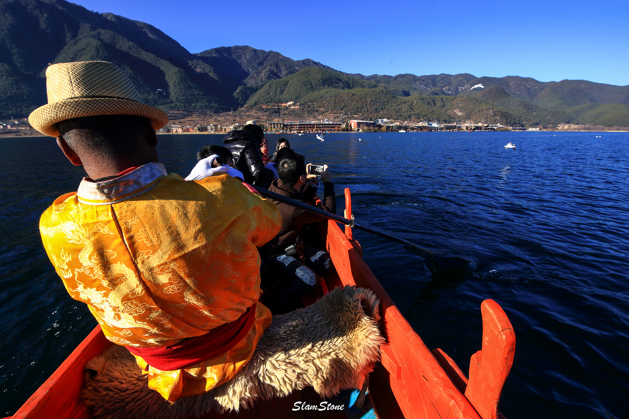 Canon EF 300mm f/2.8L sample photo. Boat man photography