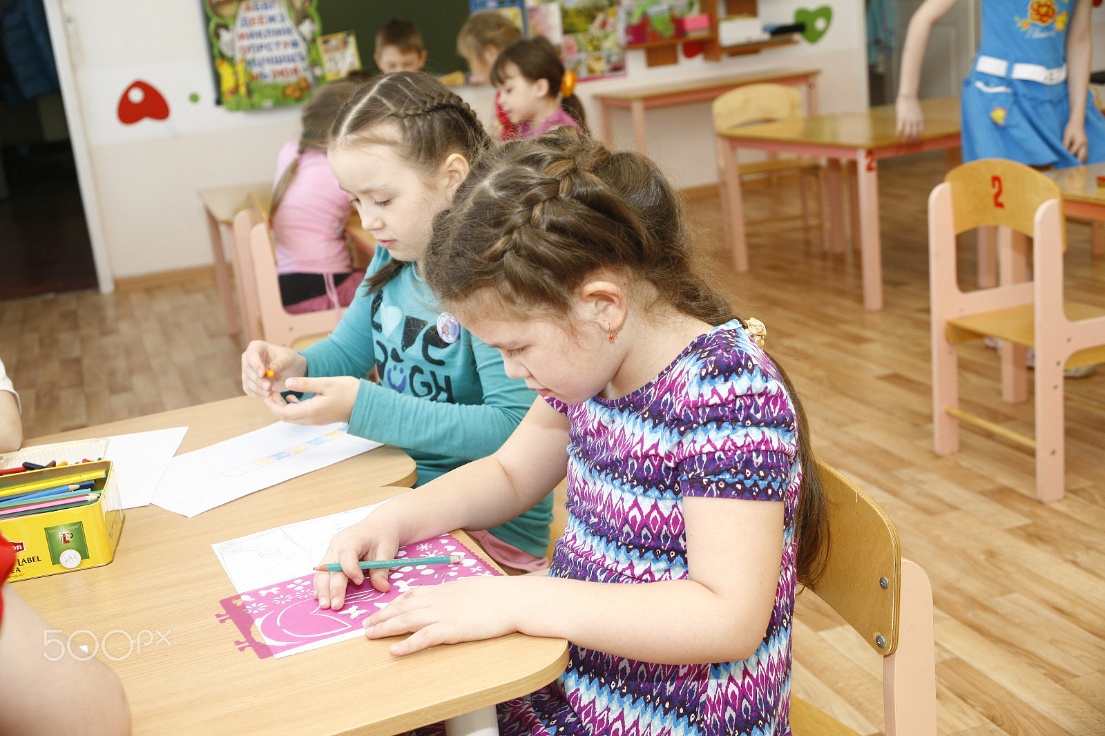 Canon EF 28-105mm f/3.5-4.5 USM sample photo. Moscow, russia-april 17, 2014: children play with toys and engage  the tutor in a kindergarten photography