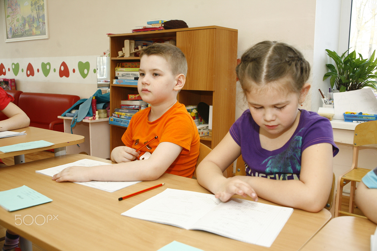 Canon EF 28-105mm f/3.5-4.5 USM sample photo. Moscow, russia-april 17, 2014: children play with toys and engage  the tutor in a kindergarten photography