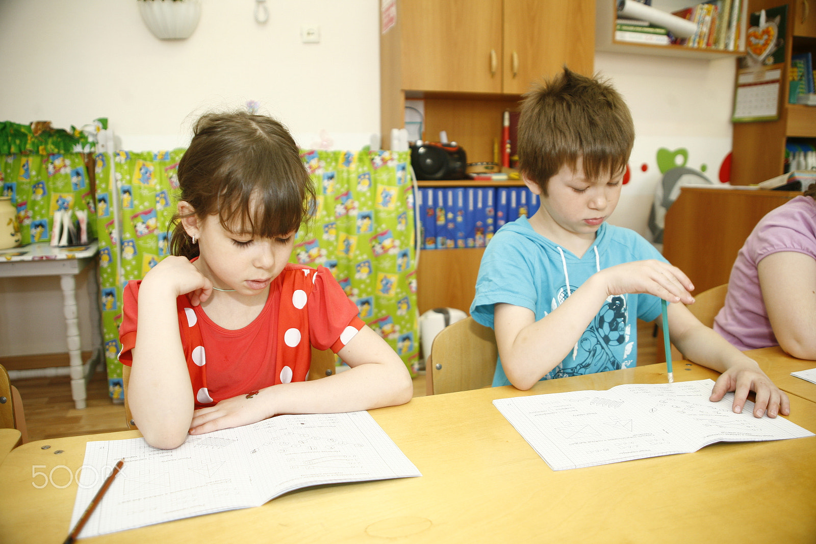 Canon EF 28-105mm f/3.5-4.5 USM sample photo. Moscow, russia-april 17, 2014: children play with toys and engage  the tutor in a kindergarten photography