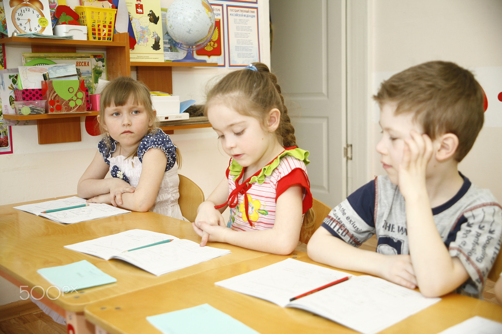 Canon EF 28-105mm f/3.5-4.5 USM sample photo. Moscow, russia-april 17, 2014: children play with toys and engage  the tutor in a kindergarten photography