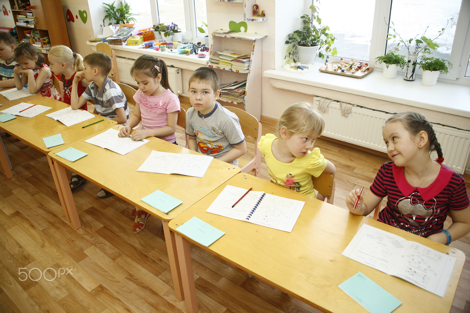 Canon EF 28-105mm f/3.5-4.5 USM sample photo. Moscow, russia-april 17, 2014: children play with toys and engage  the tutor in a kindergarten photography