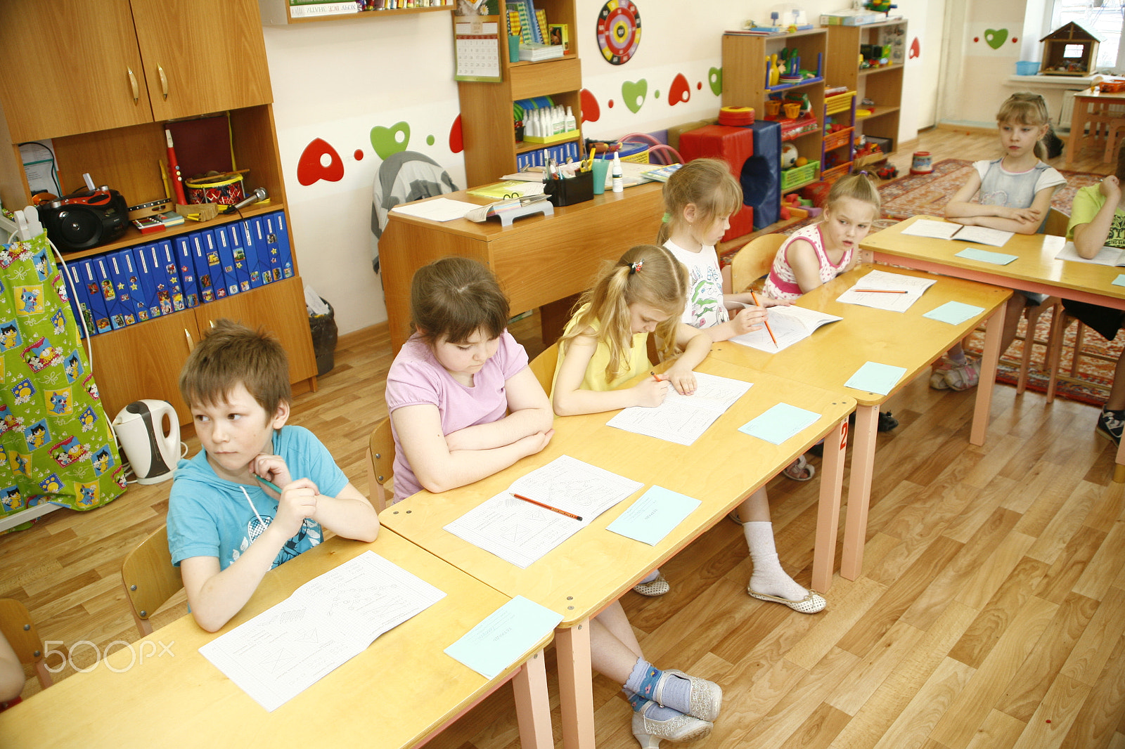Canon EF 28-105mm f/3.5-4.5 USM sample photo. Moscow, russia-april 17, 2014: children play with toys and engage  the tutor in a kindergarten photography