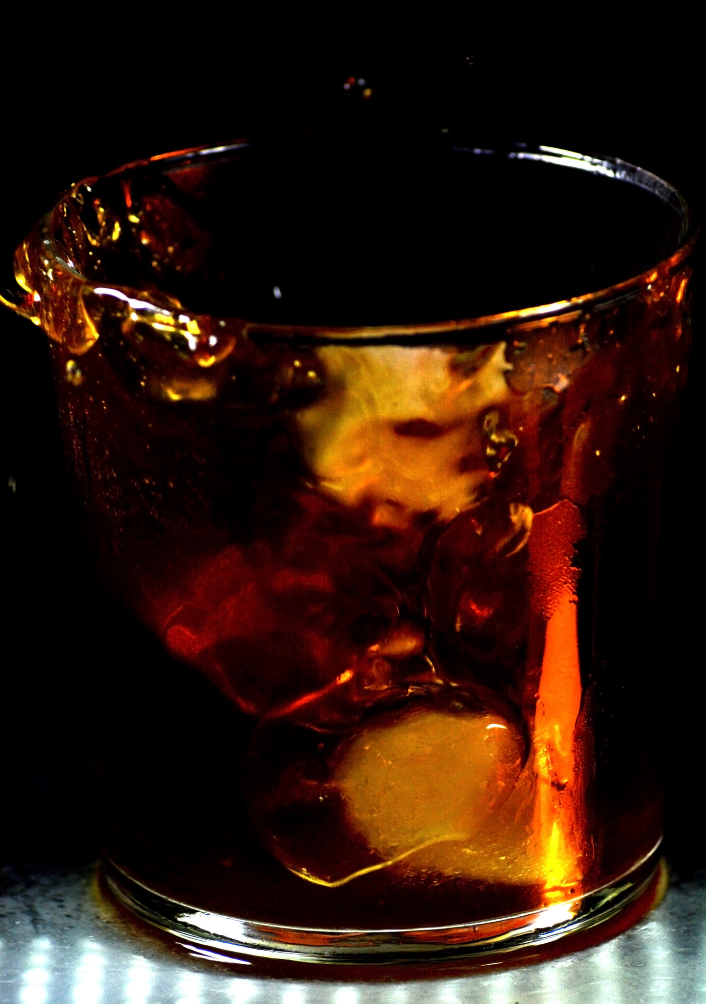 Nikon D7100 sample photo. Glass of whiskey with falling ice cubes photography