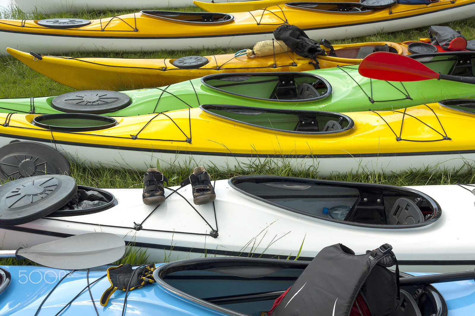 Sigma 18-125mm f/3.5-5.6 DC IF ASP sample photo. Kayaks on river bank photography