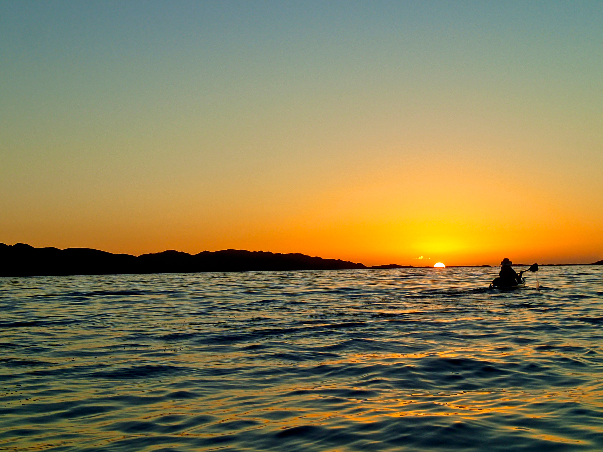 Olympus TG-2 sample photo. Paddle into the sun photography