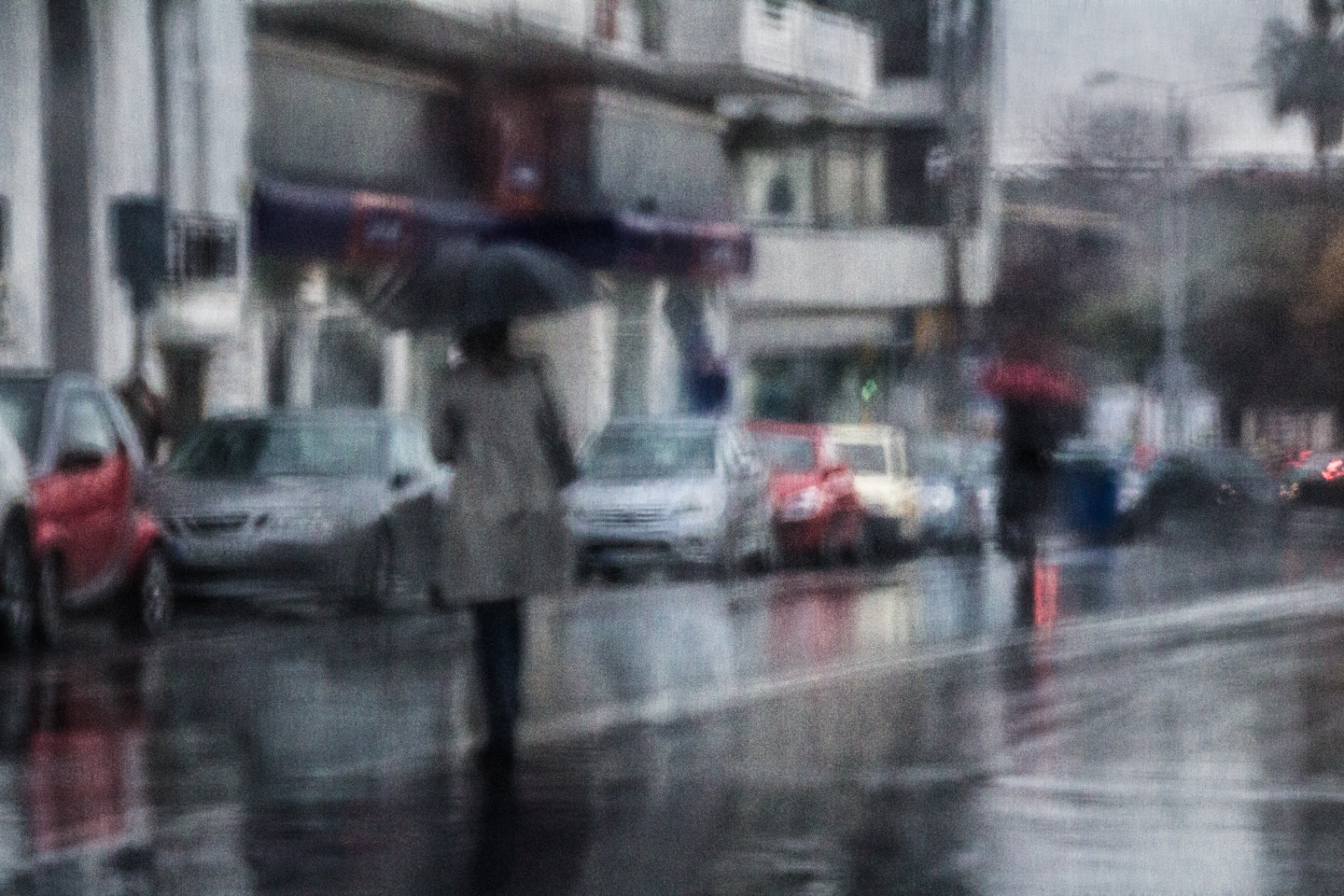 Sigma 18-250mm F3.5-6.3 DC OS HSM sample photo. Walking in the rain photography