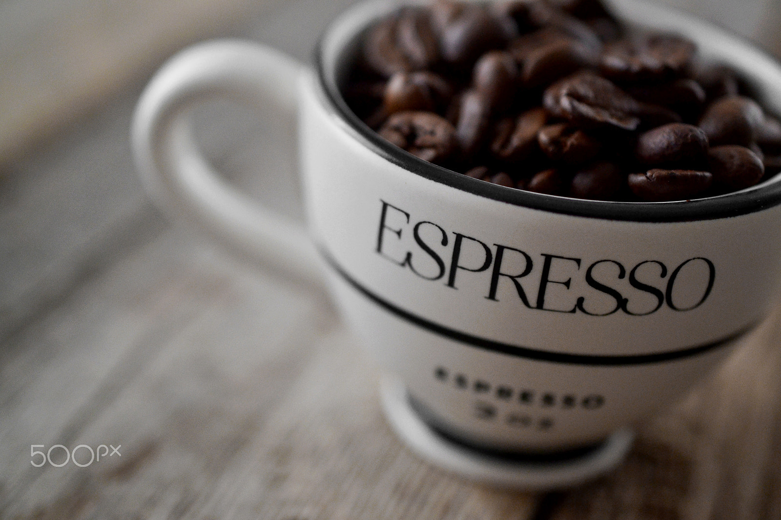 Nikon AF-S DX Micro Nikkor 40mm F2.8 sample photo. Espresso cup with coffee beans on angle photography