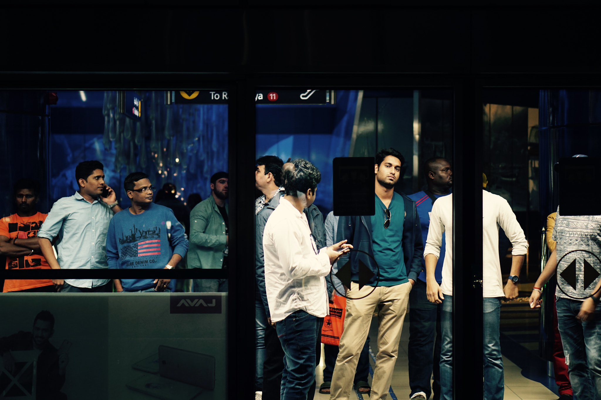 Sony E 50mm F1.8 OSS sample photo. Men in dubai metro photography