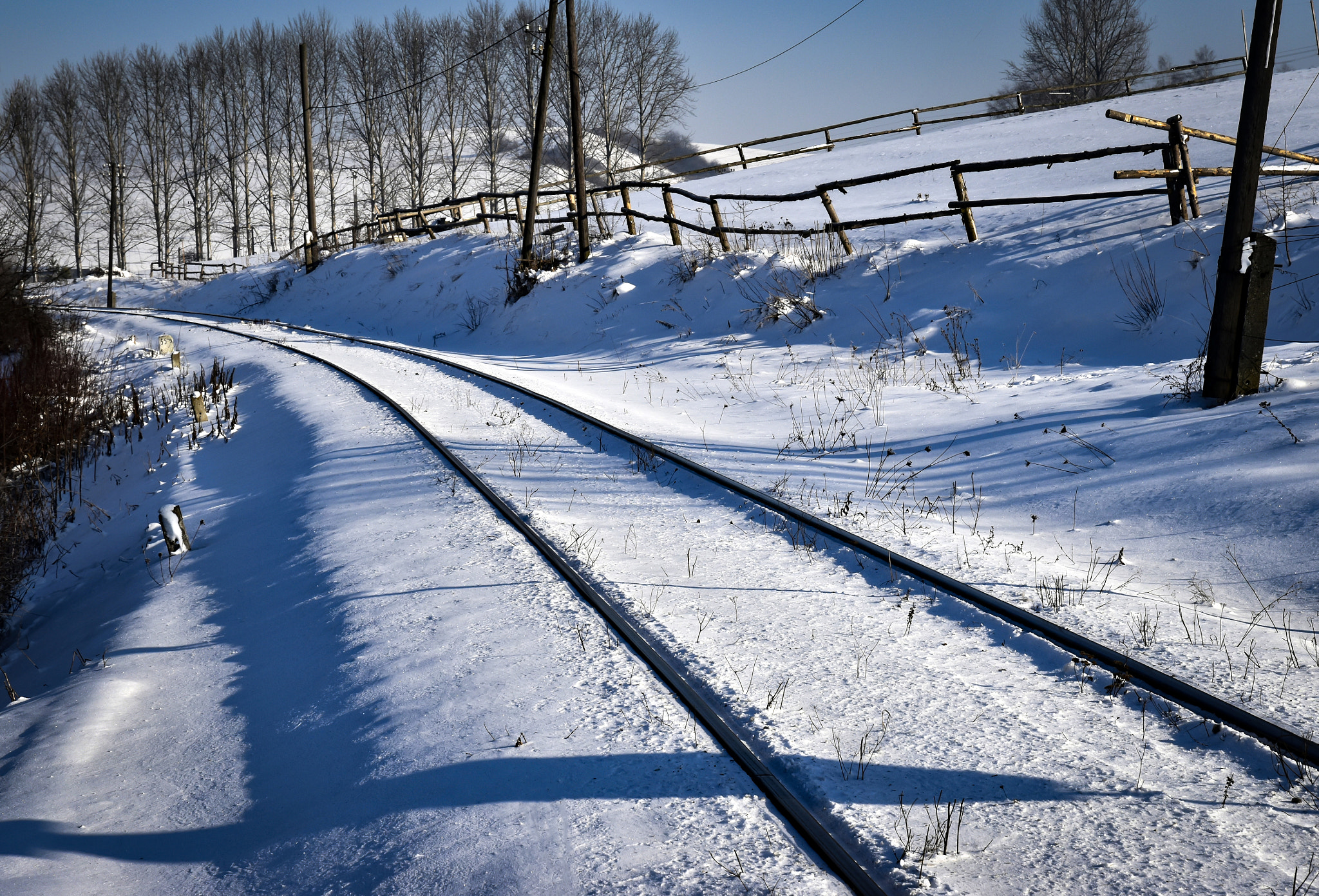 Nikon D5500 sample photo. Snow covered railway track photography