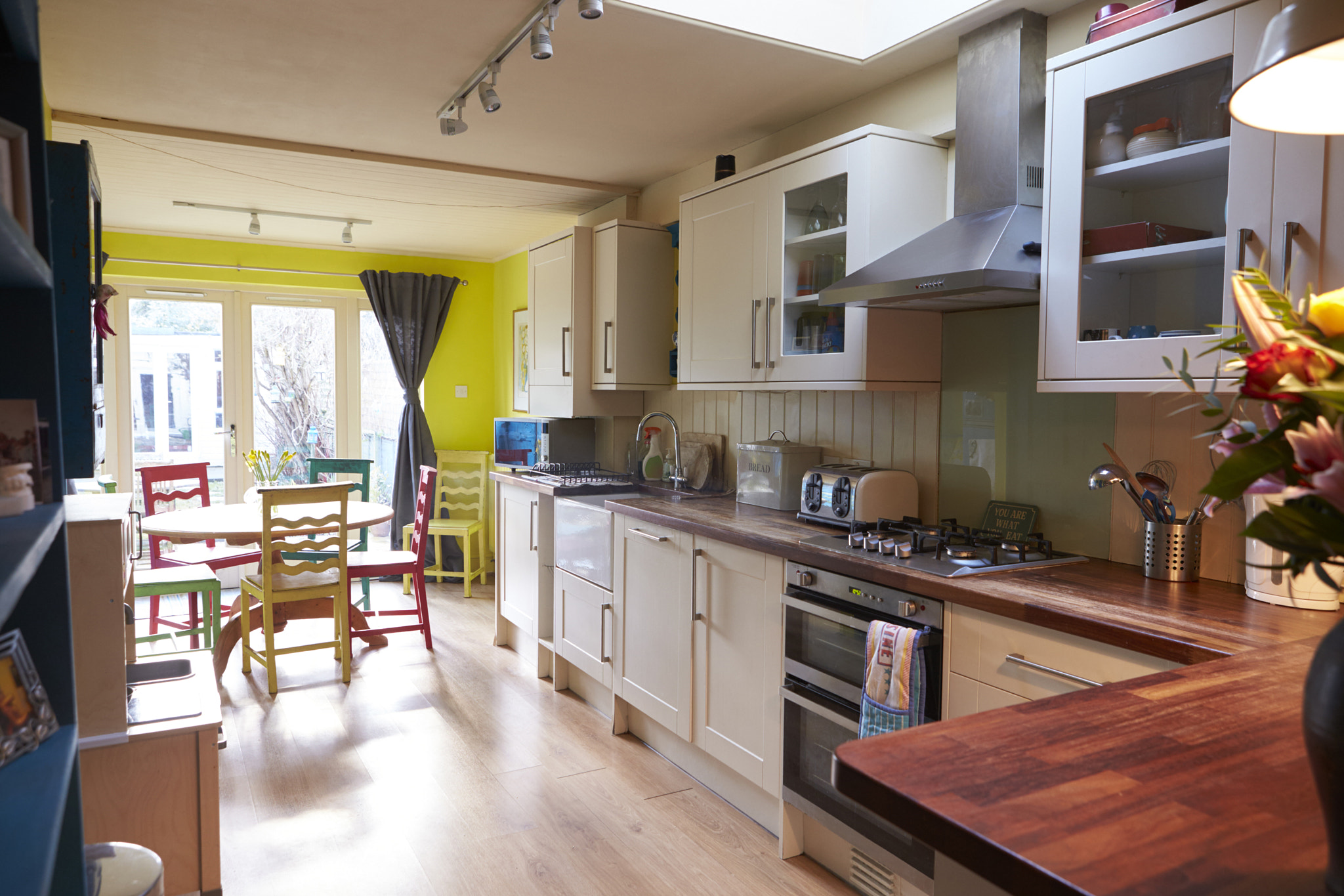 Canon EOS-1D X sample photo. Interior of apartment showing kitchen and dining areas photography