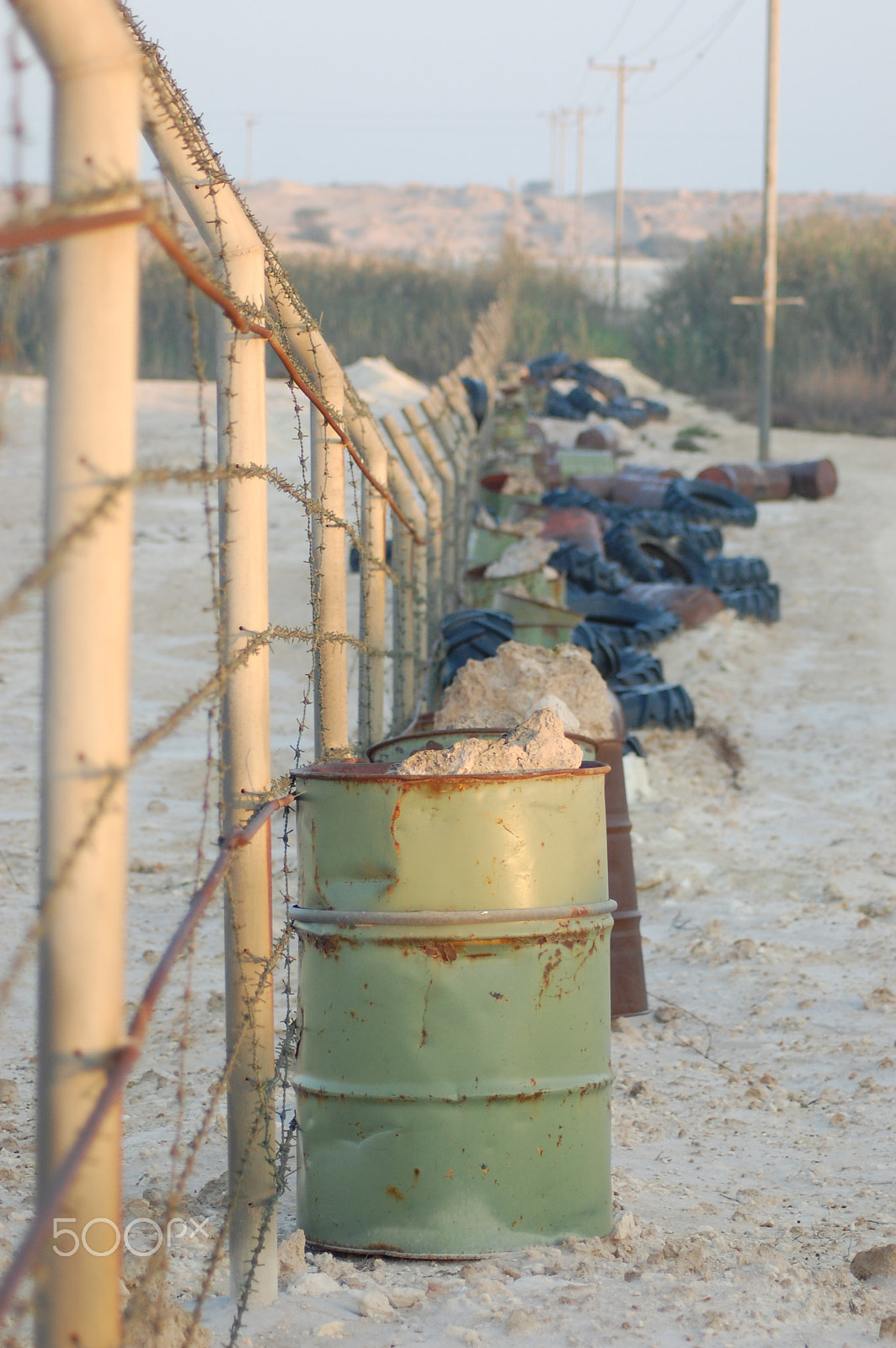 Nikon D40 + Nikon AF Nikkor 70-300mm F4-5.6G sample photo. Border fence... a new trend in this world :( photography