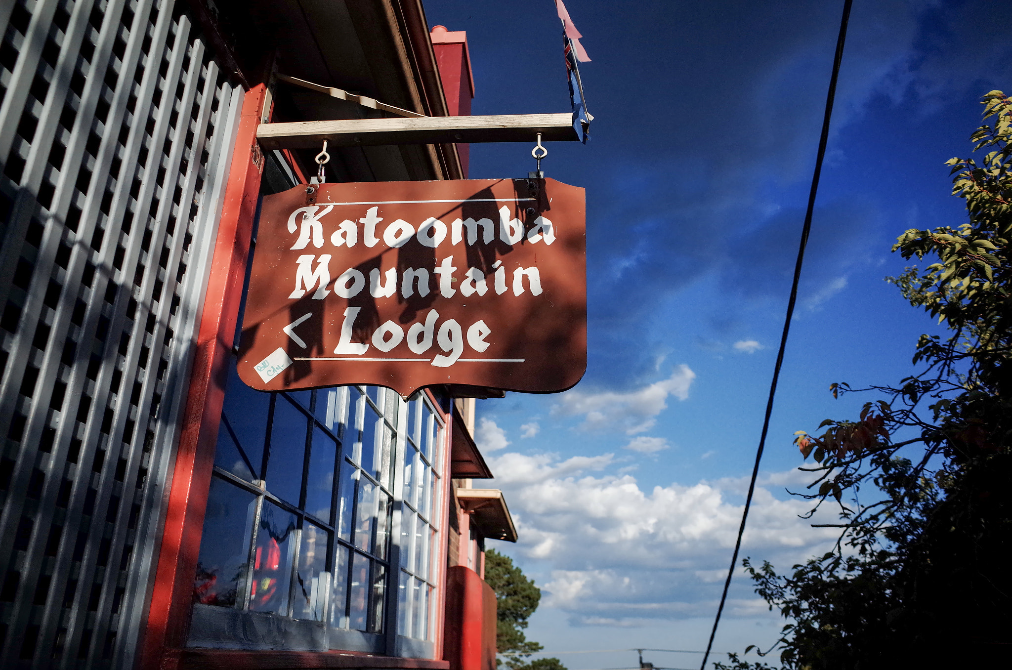 Ricoh GR + GR Lens sample photo. Traditional guesthouse exterior with a reception sign photography