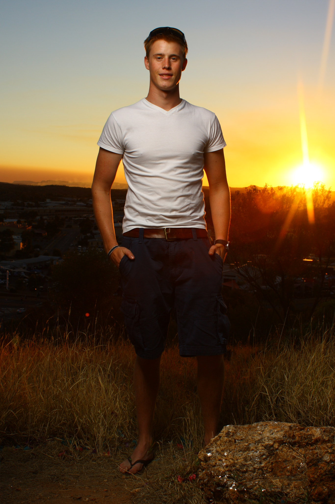 Canon EOS 40D + Canon EF 28-80mm f/3.5-5.6 sample photo. Young man at sunset, alice springs australia photography