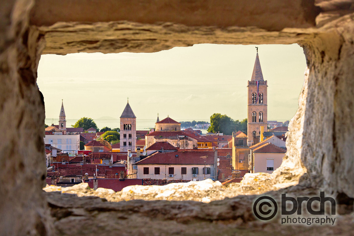 Canon EF-S 10-22mm F3.5-4.5 USM sample photo. Zadar aerial view through stone window photography