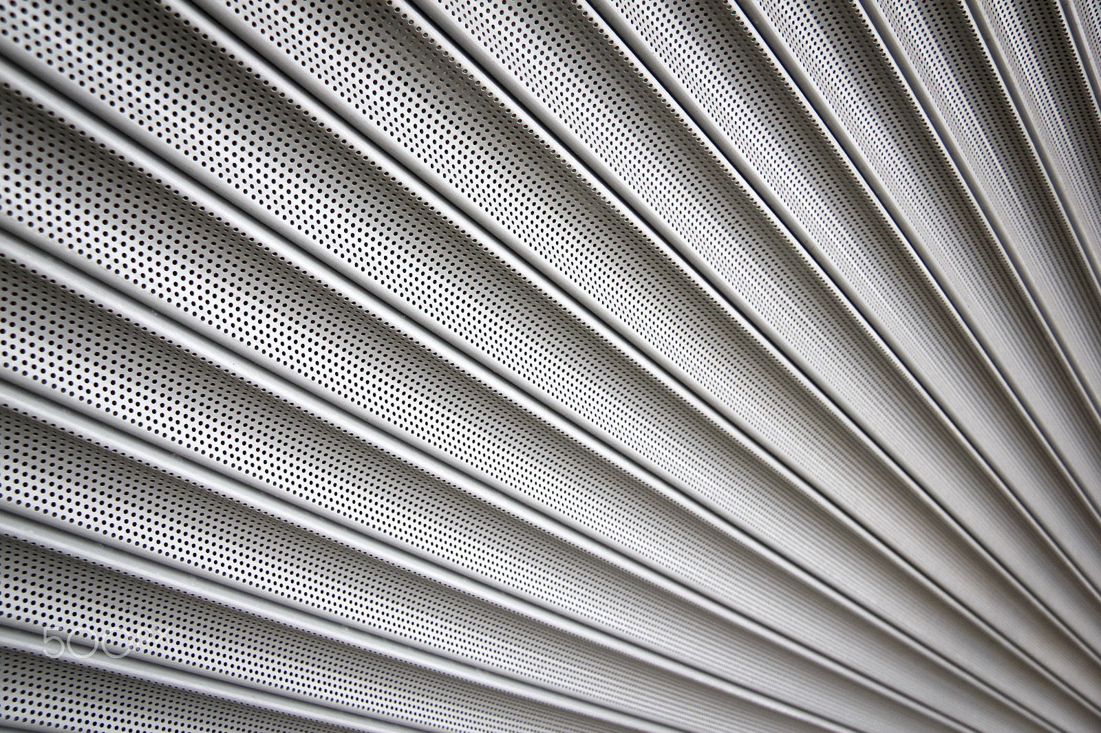 Canon EF-S 17-85mm F4-5.6 IS USM sample photo. Metal security shutters background photography