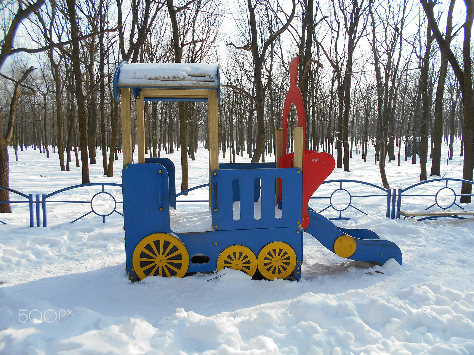 Nikon Coolpix S2900 sample photo. Bright multi-colored children's slide as a locomotive photography