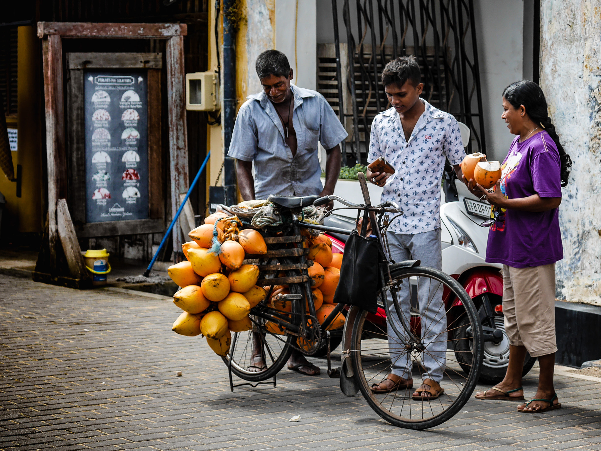 Panasonic Lumix DMC-GX7 sample photo. Selling coconuts, galle style, sri lanka photography