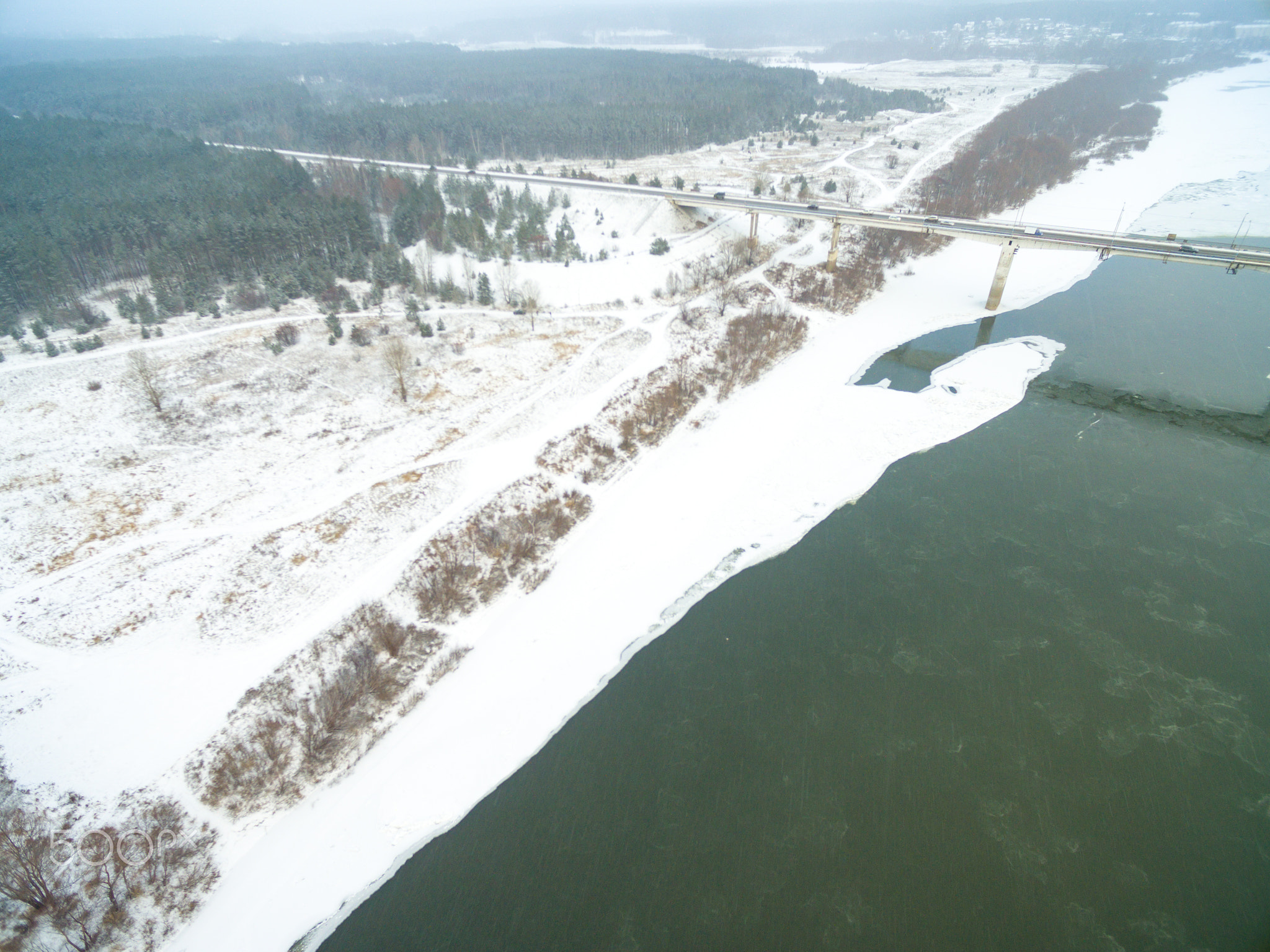 Aerial view of snow covered countryside