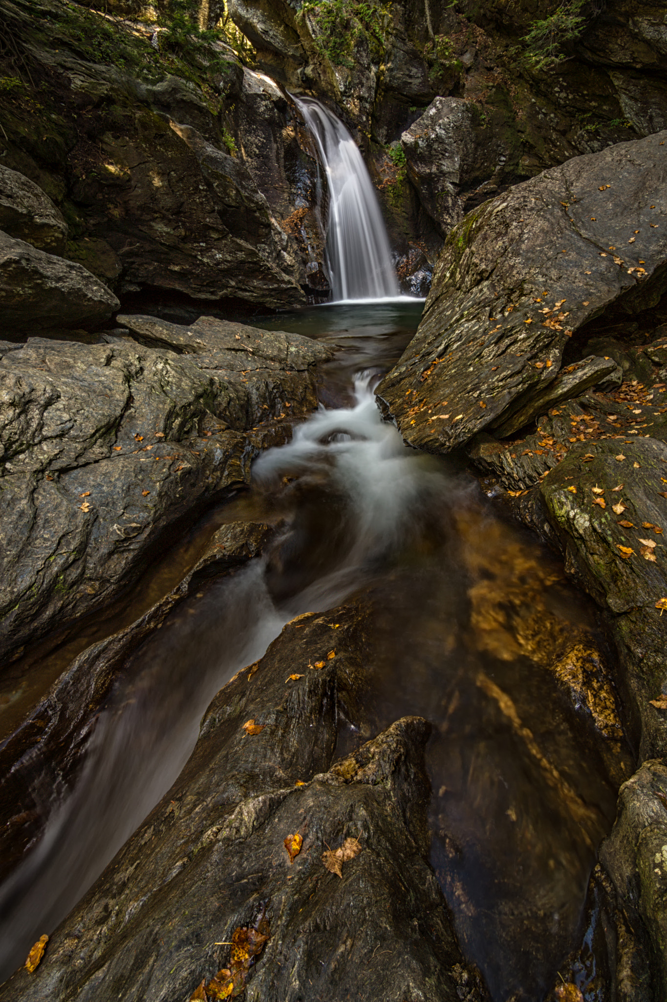 20mm F2.8 sample photo. Bingham falls stowe vt fall photography