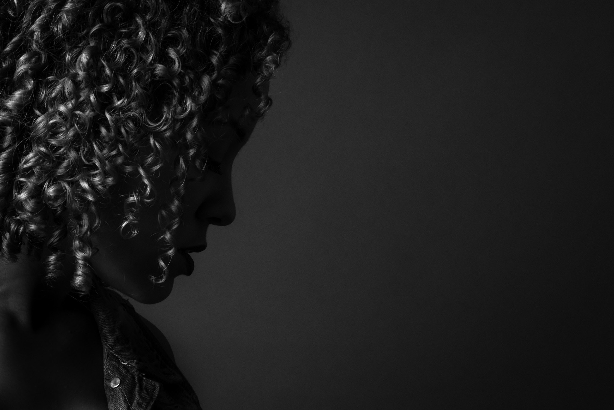 Sony a99 II sample photo. Lovely black and white profile with killer curls photography