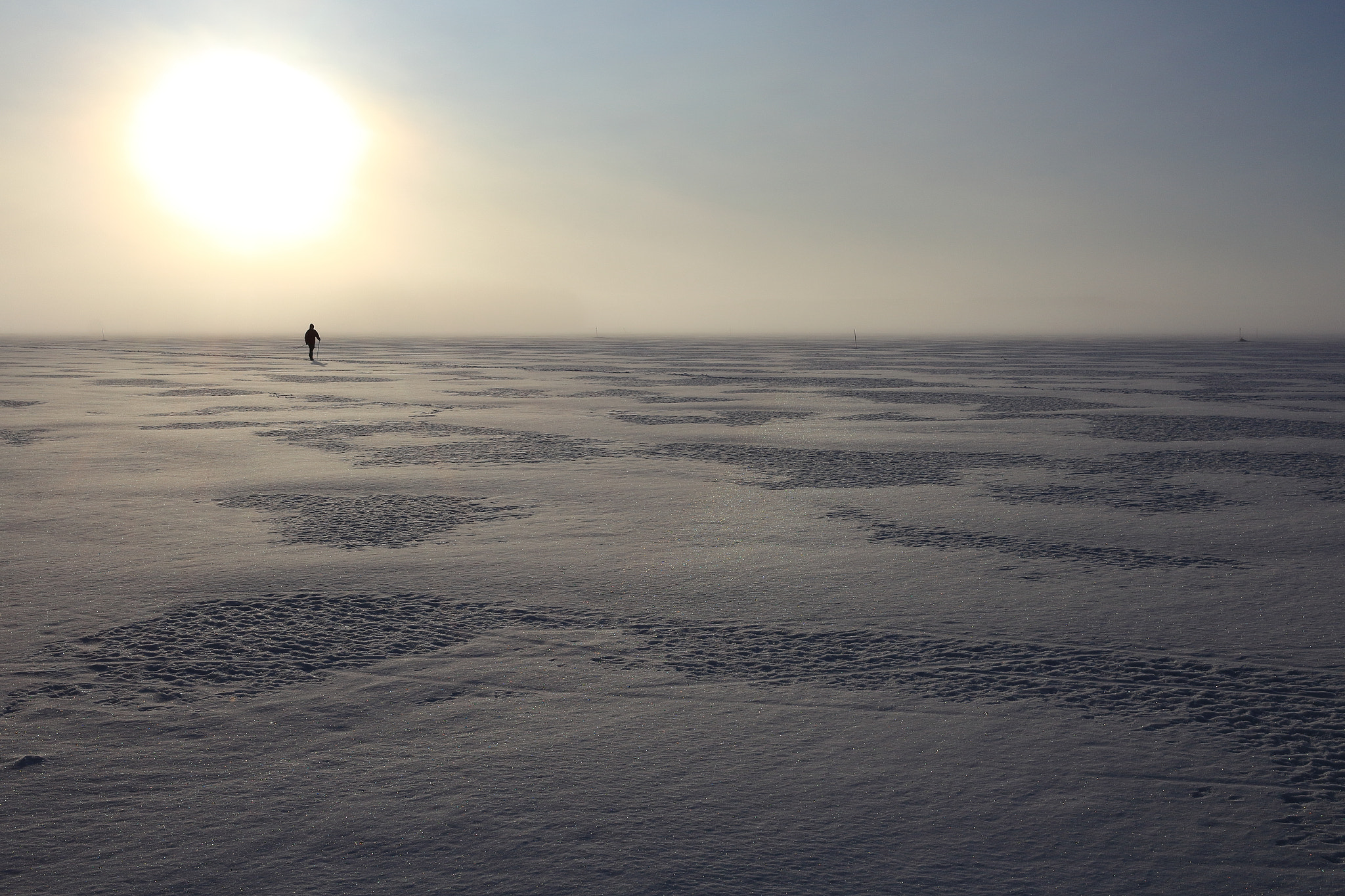 Canon EF-S 24mm F2.8 STM sample photo. Lone skier photography